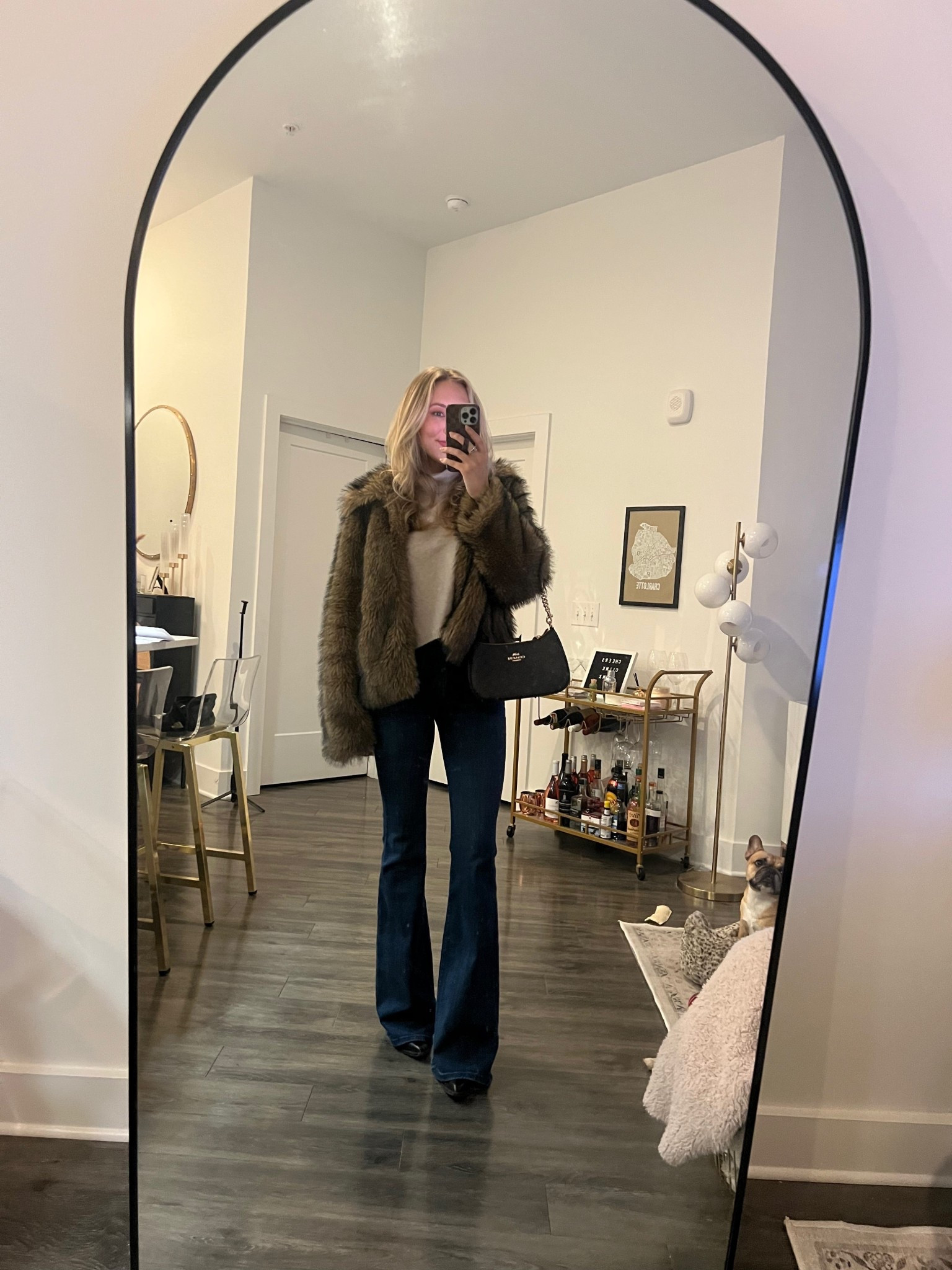 Faux fur coat, flared denim, brown and black shoulder bag, taupe sweater winter outfit 

#LTKootd #LTKSeasonal