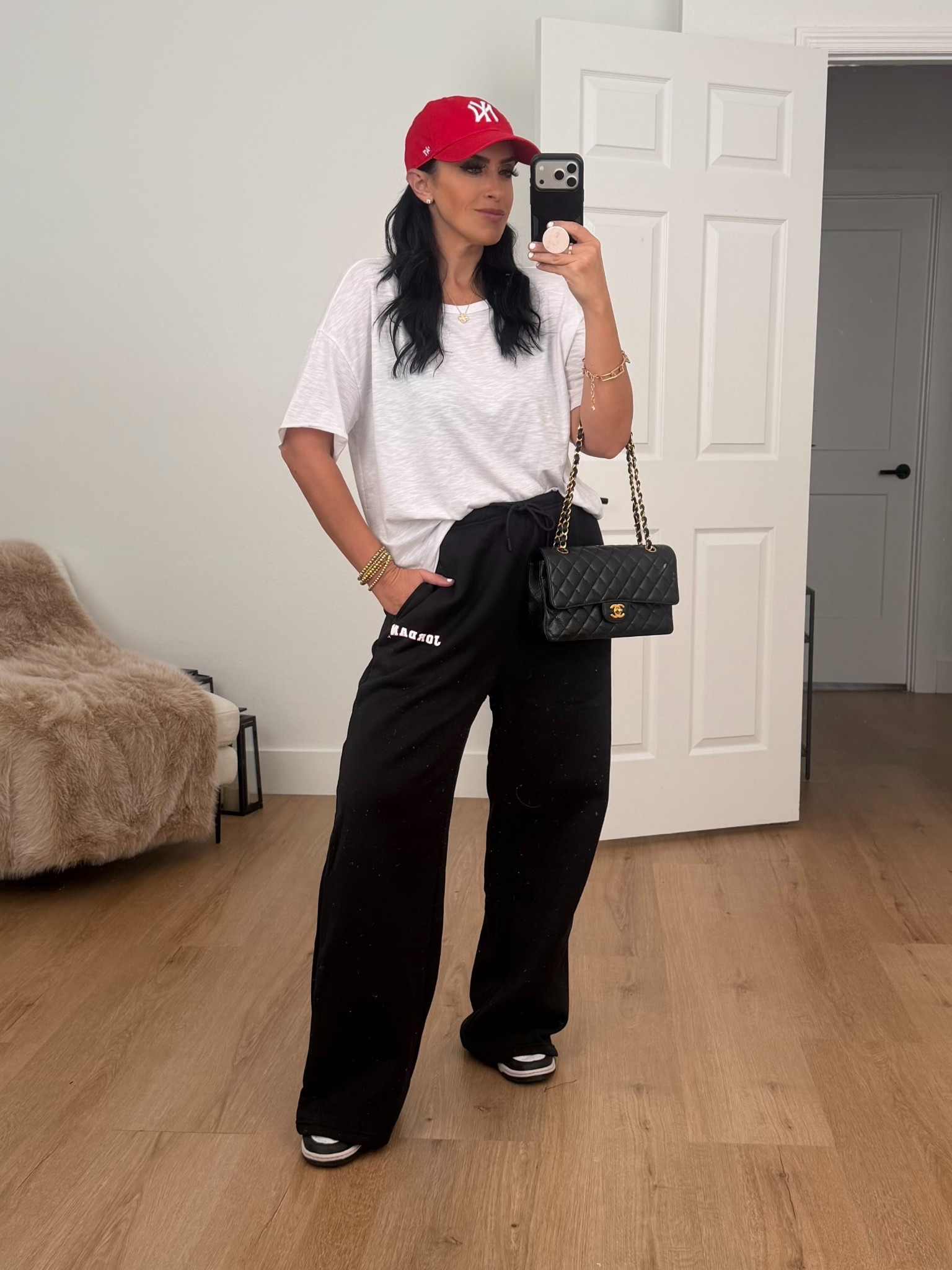 Jordan Brooklyn Fleece wearing size medium. White tshirt. 
