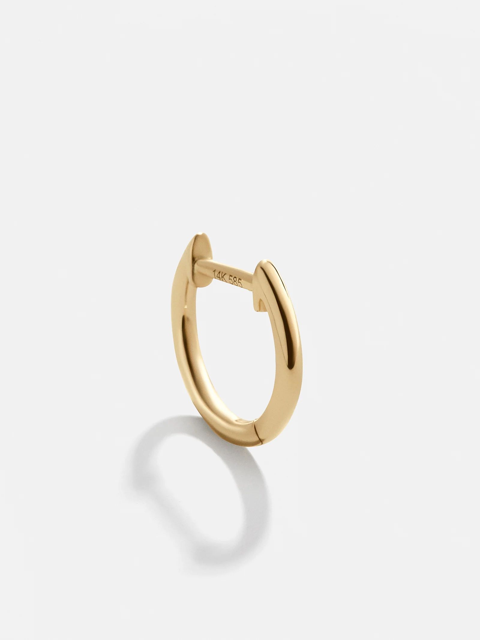 Solid Gold Huggie Hoop Earring | BaubleBar (US)