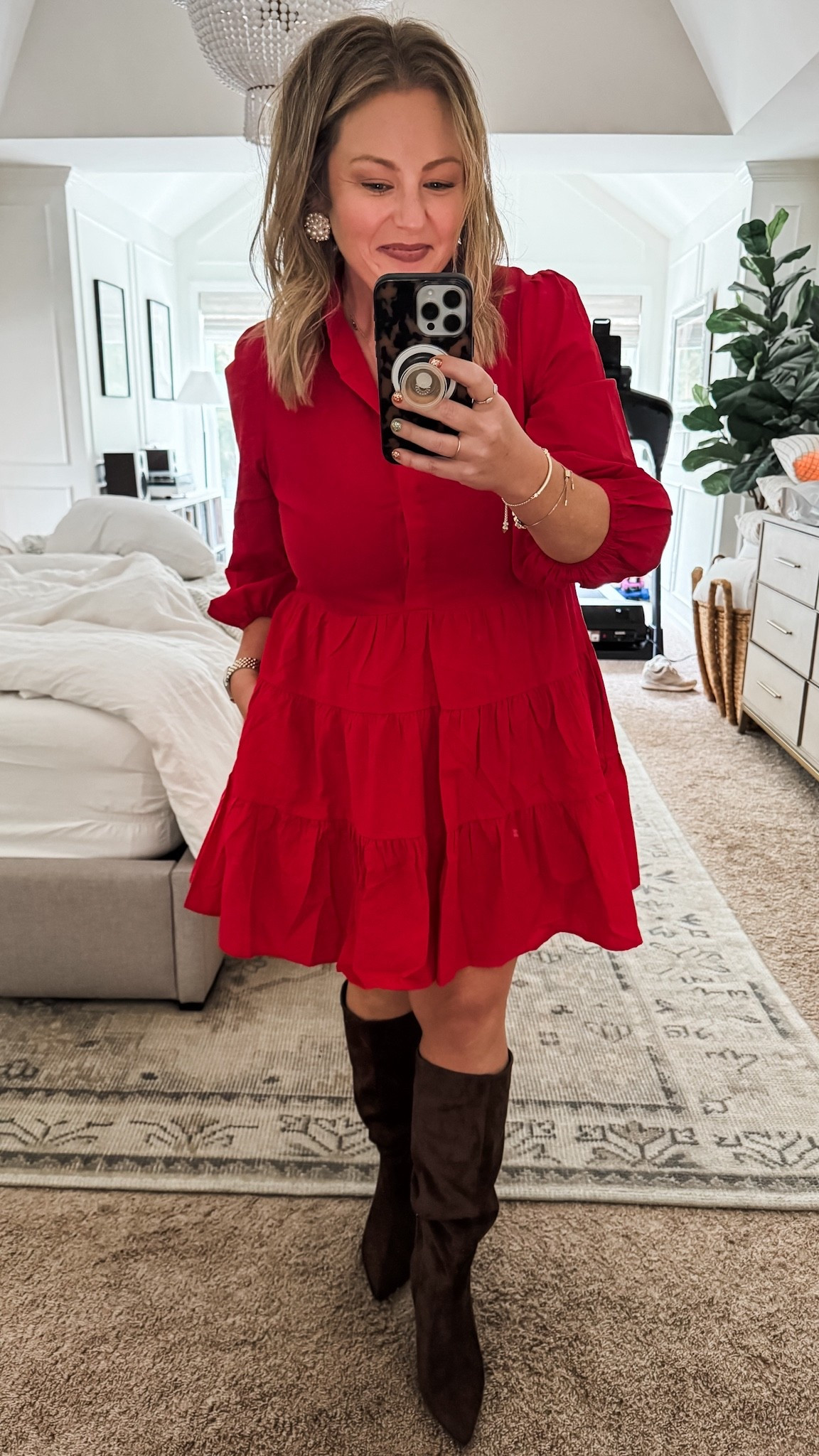 I first got this fired mini skirt dress in navy and loved it so much that I went back for the red. Here, I’ve paired it with tall suede boots and accessorized with these darling raffia earrings. The dress is 50% off and the earrings are on sale too! date night outfit party dress short dress red dress Christmas dress

#LTKSaleAlert #LTKFindsUnder100 #LTKBeauty