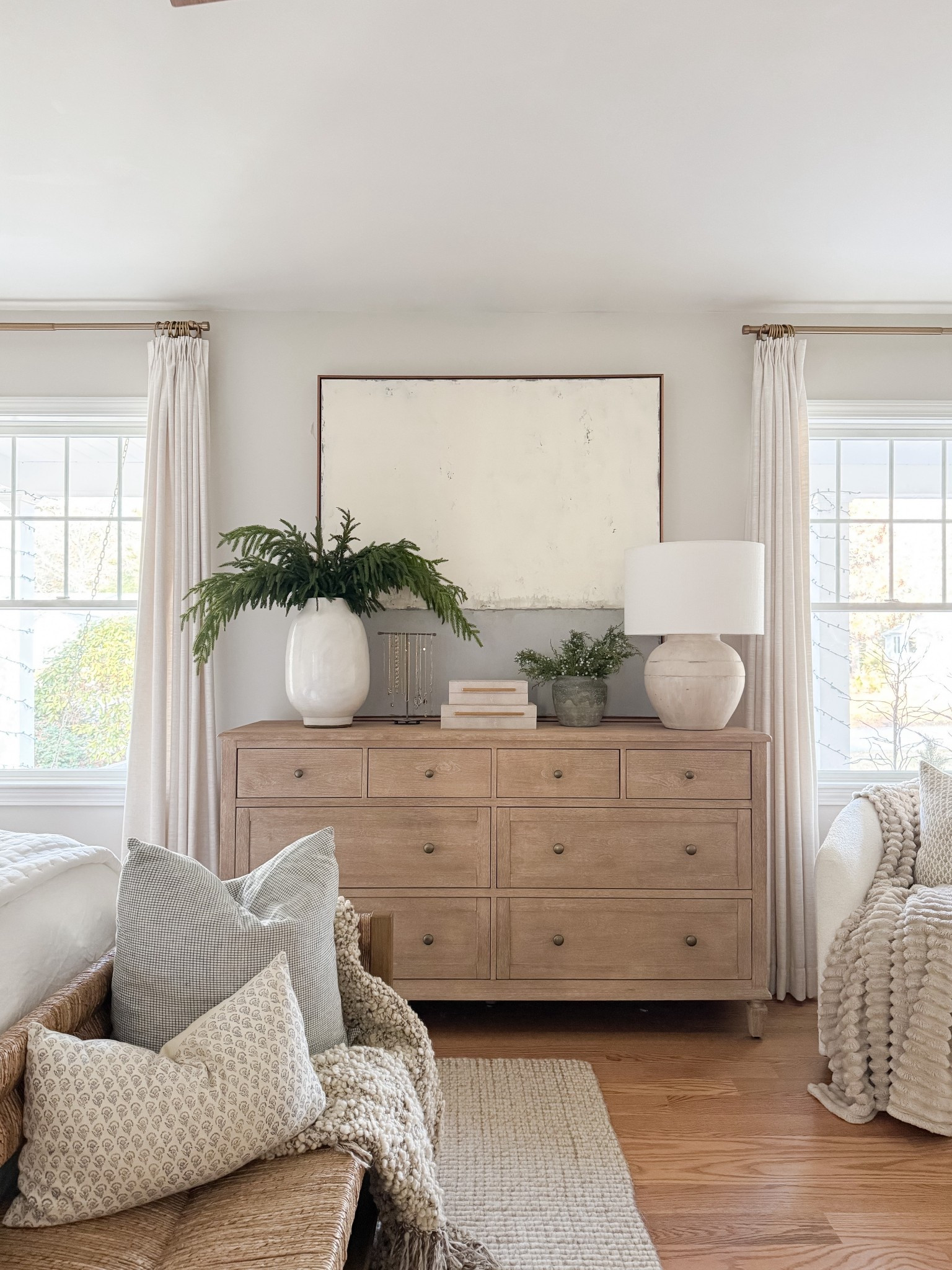 Light wood furniture styled with ceramics and greenery brings warmth and balance to the bedroom. coastal bedroom furniture, wood dresser styling, neutral home decor, coastal interiors, bedroom styling ideas, timeless bedroom, natural textures, home inspiration, sherricalnanhome

#LTKHome #LTKFindsUnder50