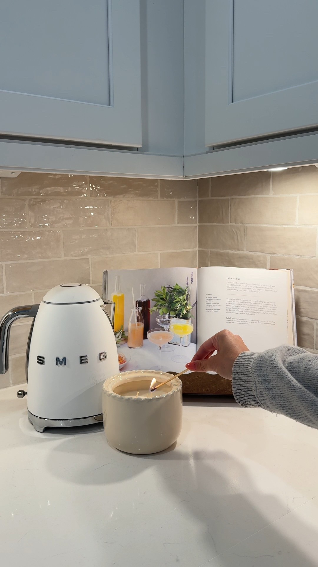 A little spring kitchen corner refresh 🤍 added in this cute spring candle from Target & the scalloped cookbook holder from magnolia🌸🌼🌷 #kitchendecor #springfinds #springhome

#LTKHome #LTKFindsUnder50 #LTKStyleTip