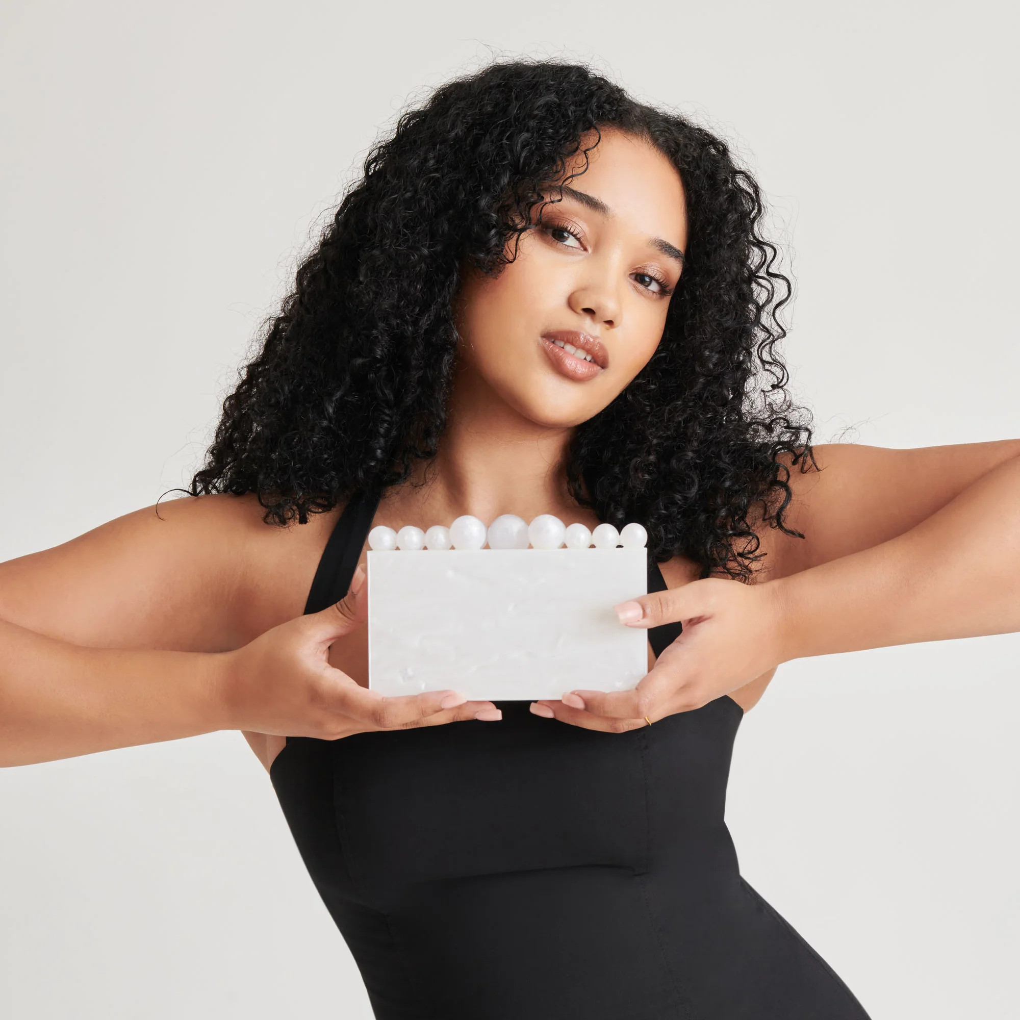 GERRY CLUTCH WHITE PEARL ACRYLIC | DolceVita.com