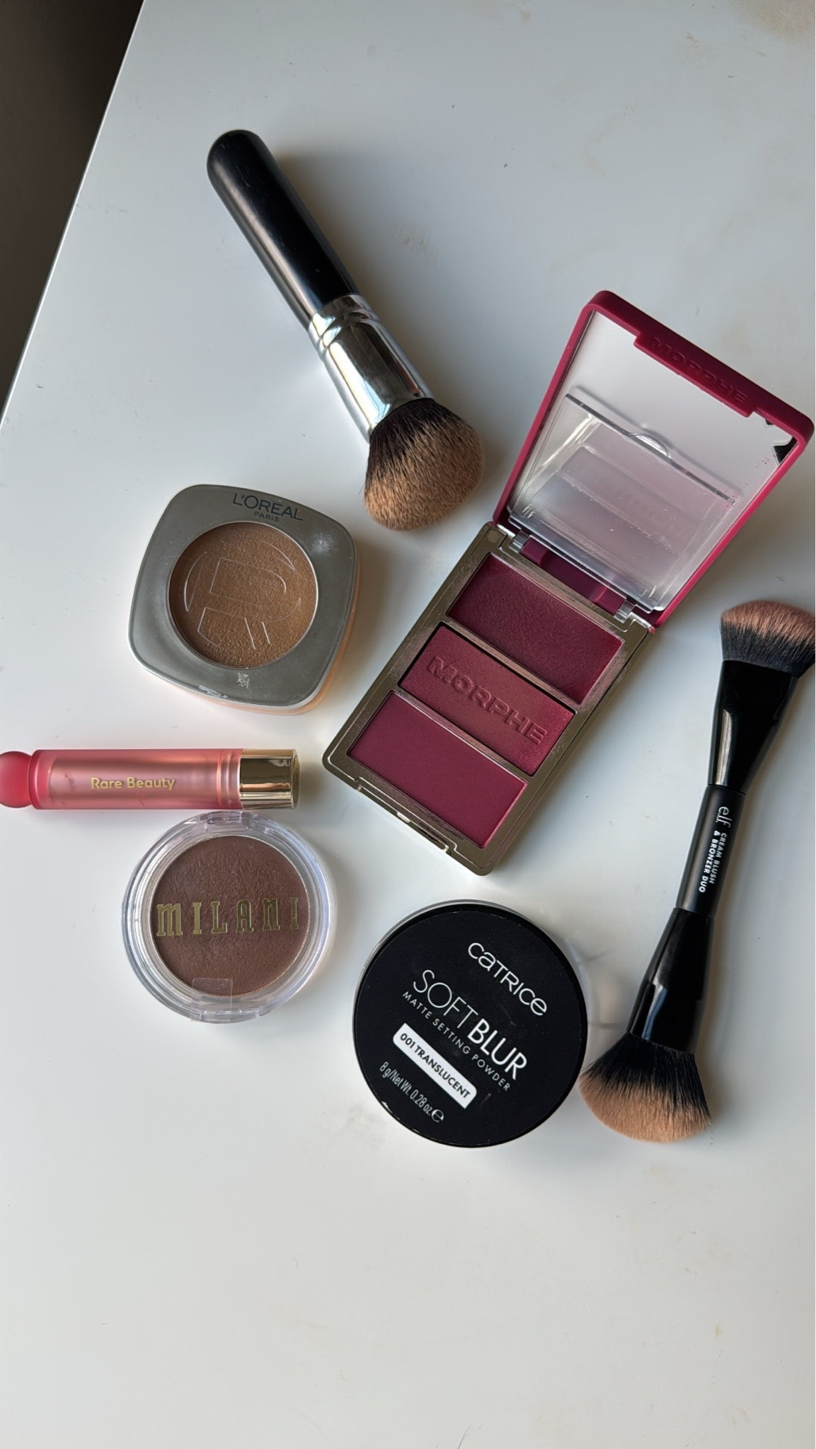 Quick and easy makeup today! // L’Oréal balm, shade 5 // Milani cream bronzer, shade spicy season // Morphe blush trio, shade wine and dine // Catrice translucent soft blur setting powder // Rare beauty lip oil stick, shade dream

#LTKBeauty
