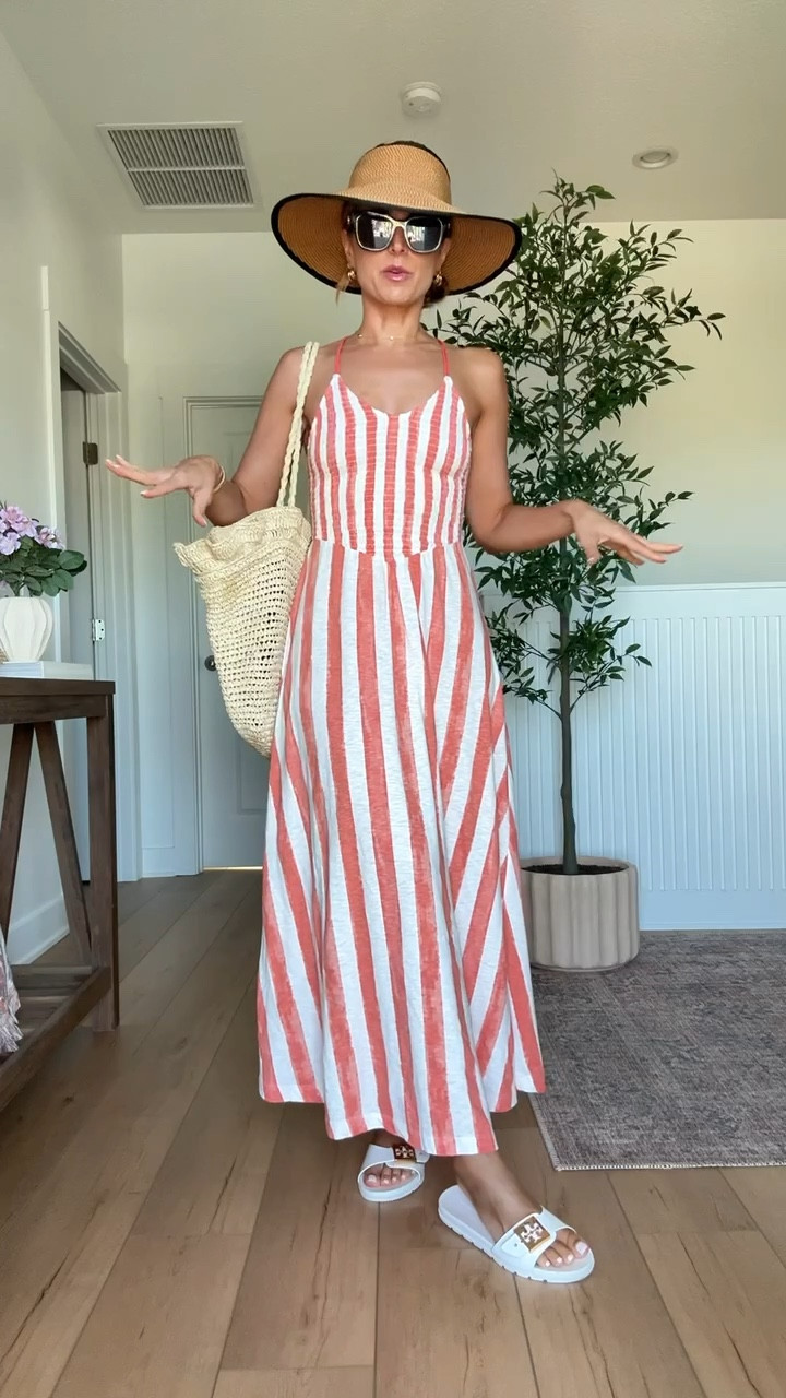 My beach outfit of the day! XXS in striped maxi dress! Beach day. Resort outfit. Resort wear. Vacation outfit. Vacation dress. Tory Burch buckle jelly sandals. Eric Javits packable UPF 50+ hat. Target straw bag. Gucci sunglasses. 


#LTKSwim #LTKootd #LTKTravel