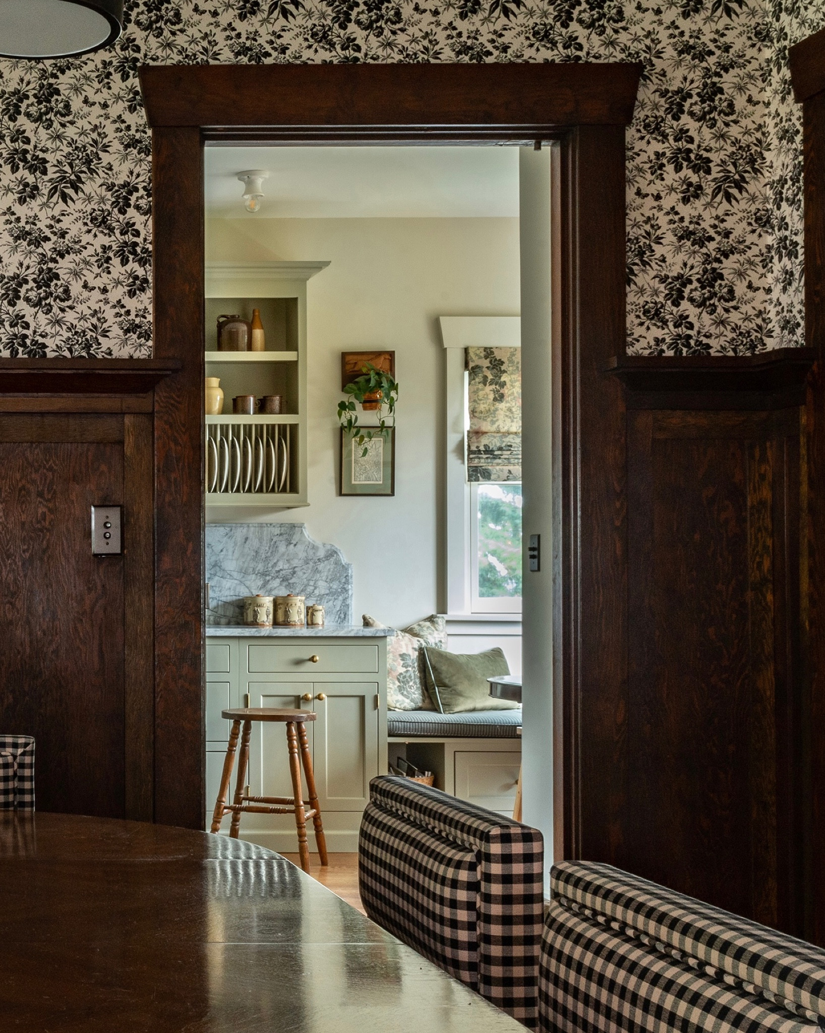 Looking through our dining room into our kitchen. You can see the white flush mounts that we installed in place of can lights. #ourseattlecraftsman 

#LTKhome