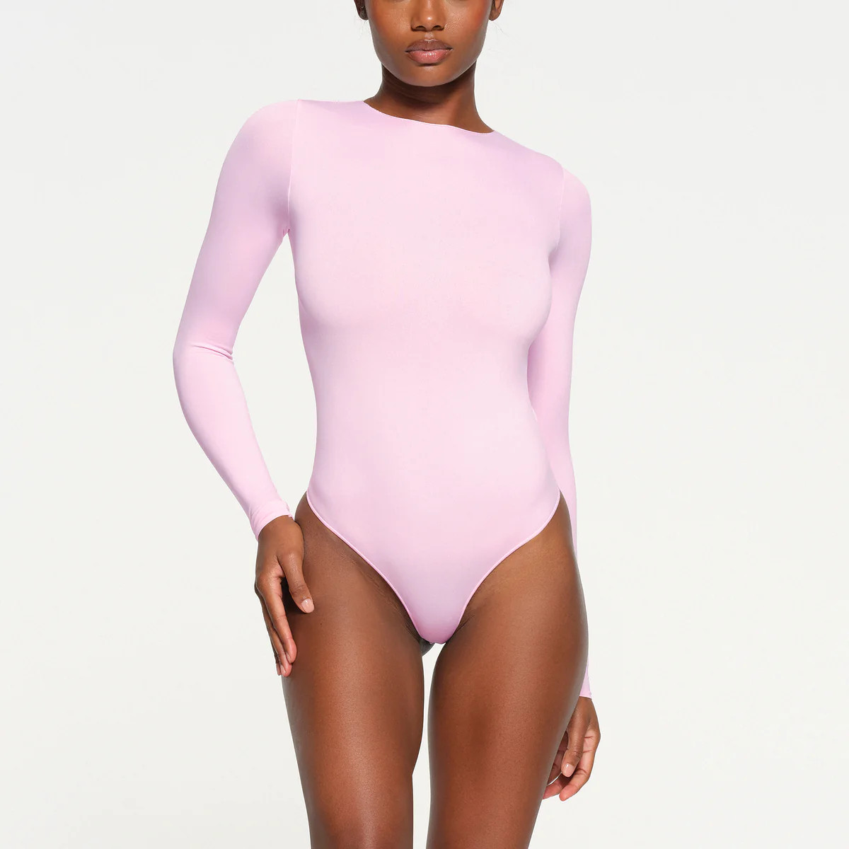 ESSENTIAL CREW NECK LONG SLEEVE BODYSUIT | SKIMS (US)