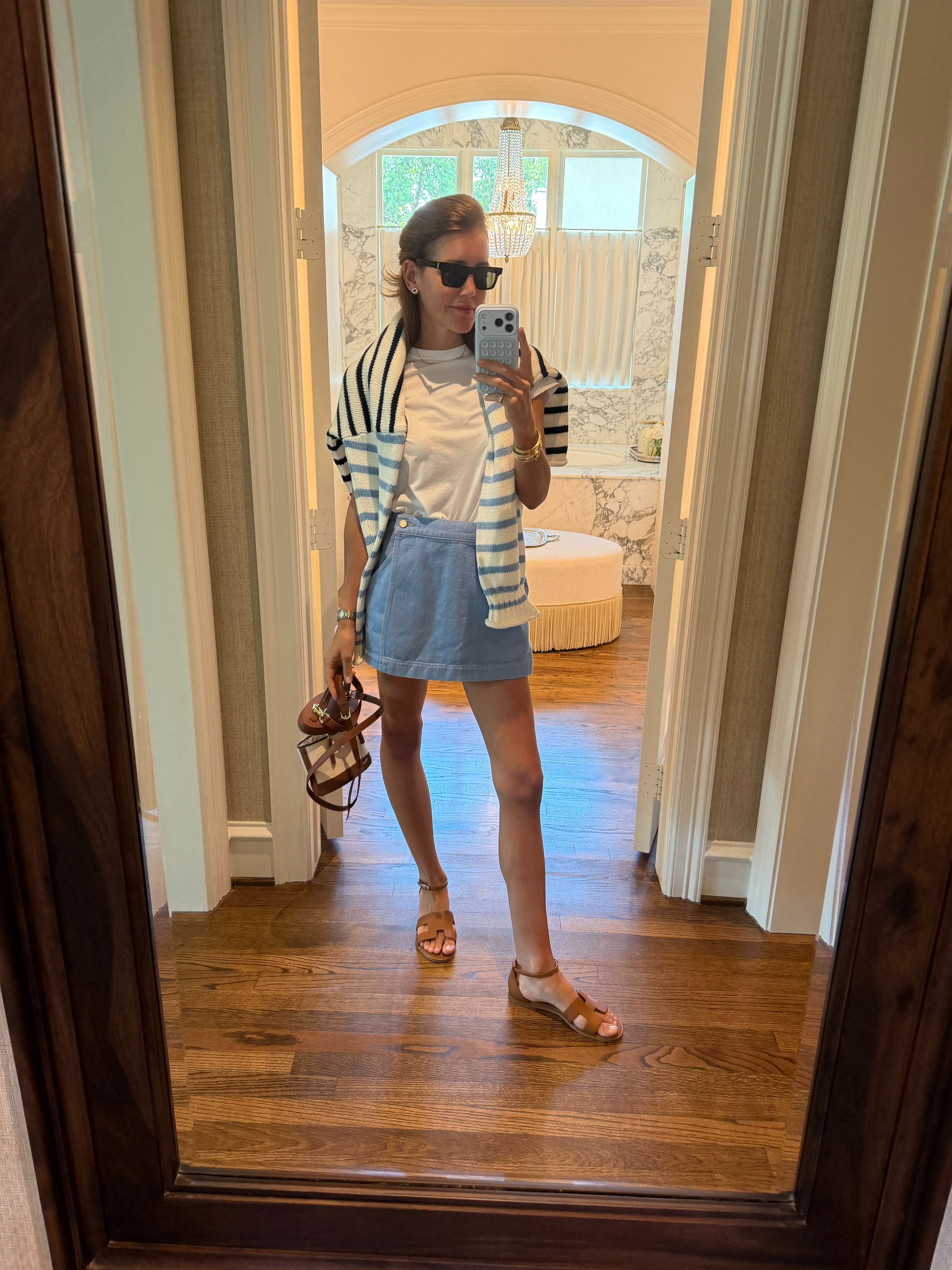 saint laurent sunnies // frame t-shirt // j.crew sweater // veronica beard skort // hermes sandals // paris 64 bag 

 