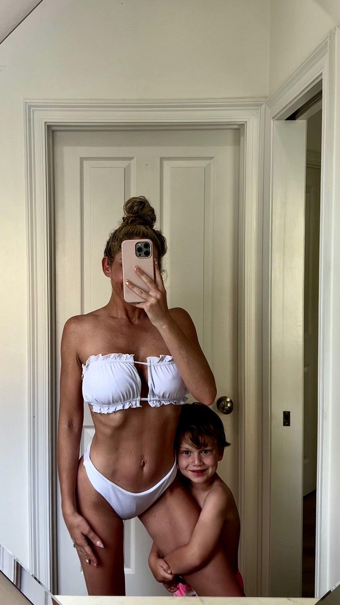 Cute white bikini 🐚 top runs large but only looks a little wonky here because I’m busy swimming & playing in the pool with the kiddos!! Very similar style to teal bikini I’ve posted twice before.

#LTKActive #LTKSummerEdit #LTKSwim