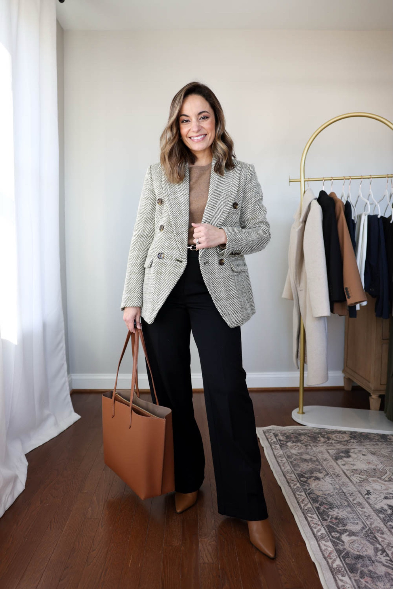 Winter workwear capsule series: black pants six ways 

This capsule has 16 pieces (not including shoes and bags) and 30 outfits! 

Herringbone blazer (banana republic factory): petite xxs 
Camel sweater (quince): xs teak 
Black pants (Ann Taylor): petite 00 
Tan boots are sold out (but linked in case they restock) 

My measurements for reference: 4’10” 105lbs bust, waist, hips 32”, 24”, 35” size 5 shoe. 25” inseam measurement to my ankle bone.