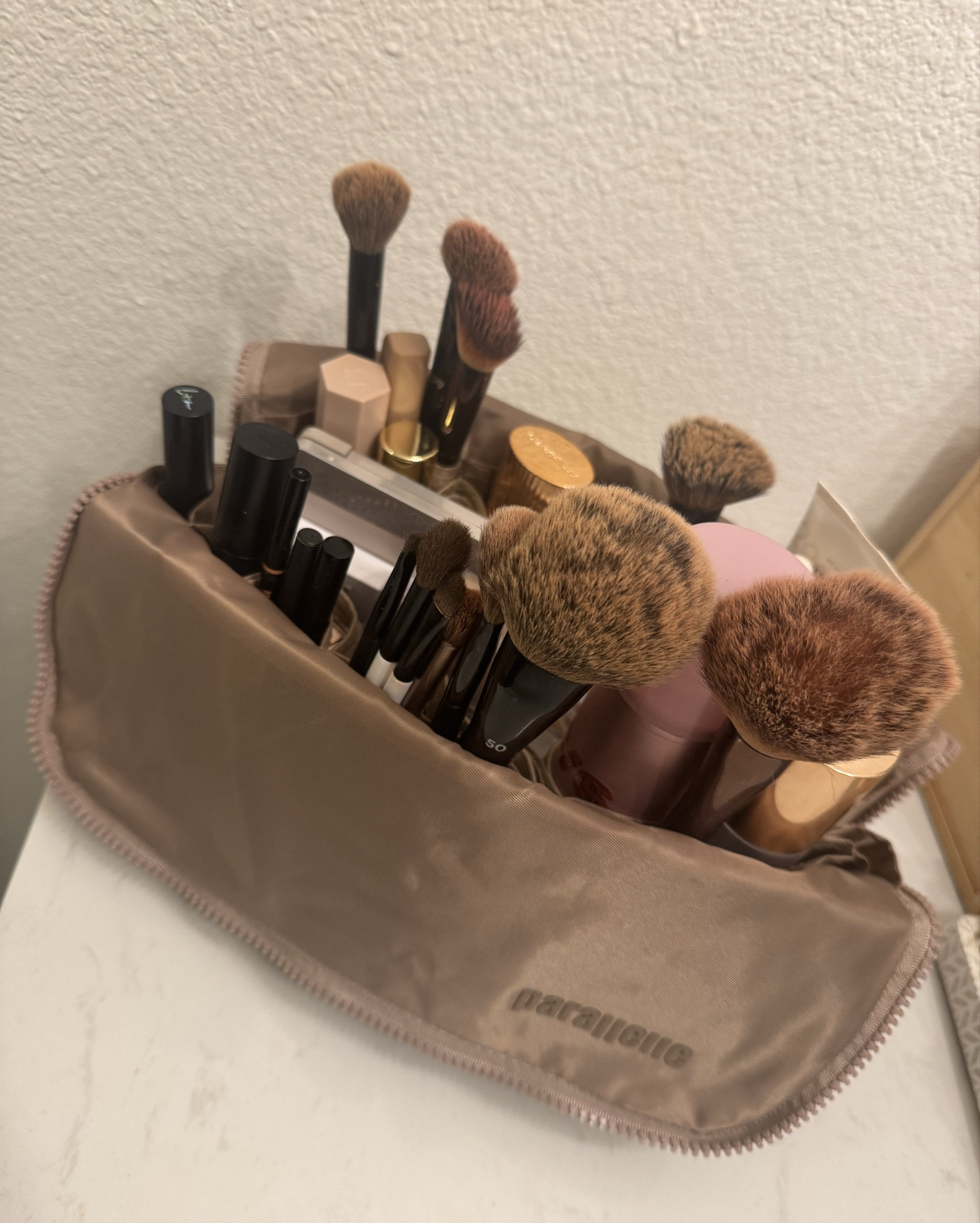 new travel bags! I love how everything stands upright. I got the large (pictured) for makeup and medium for skincare. Color: bronze. 

#LTKBeauty #LTKTravel #LTKGiftGuide