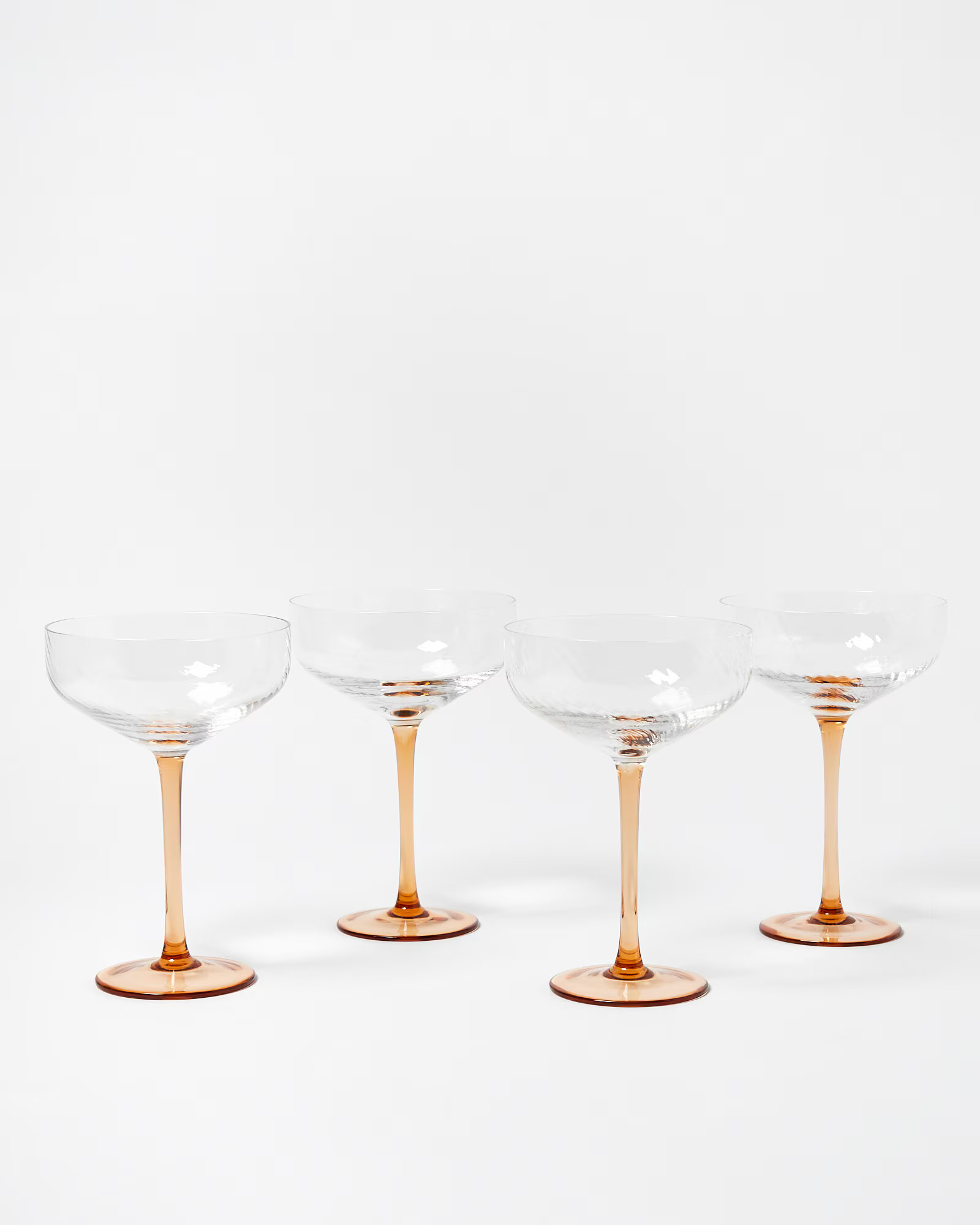 Raya Peach Glass Champagne Saucers Set of Four | Oliver Bonas | Oliver Bonas (Global)