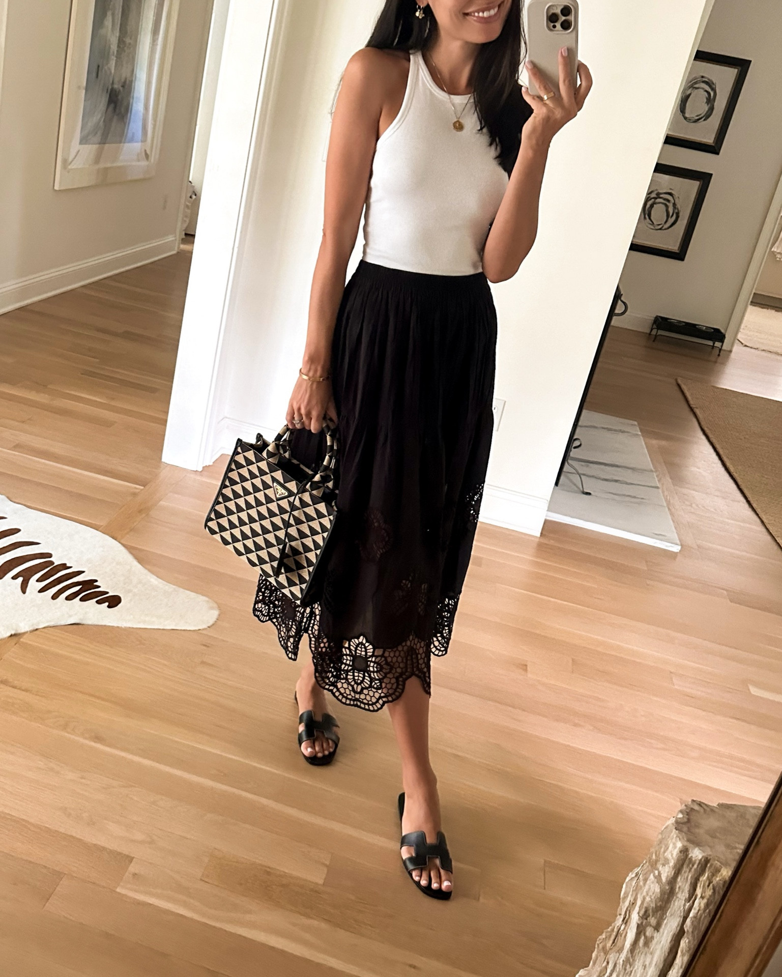 Tank top, eyelet skirt, Prada bag, Hermes sandals. 

#LTKShoeCrush #LTKItBag #LTKSeasonal