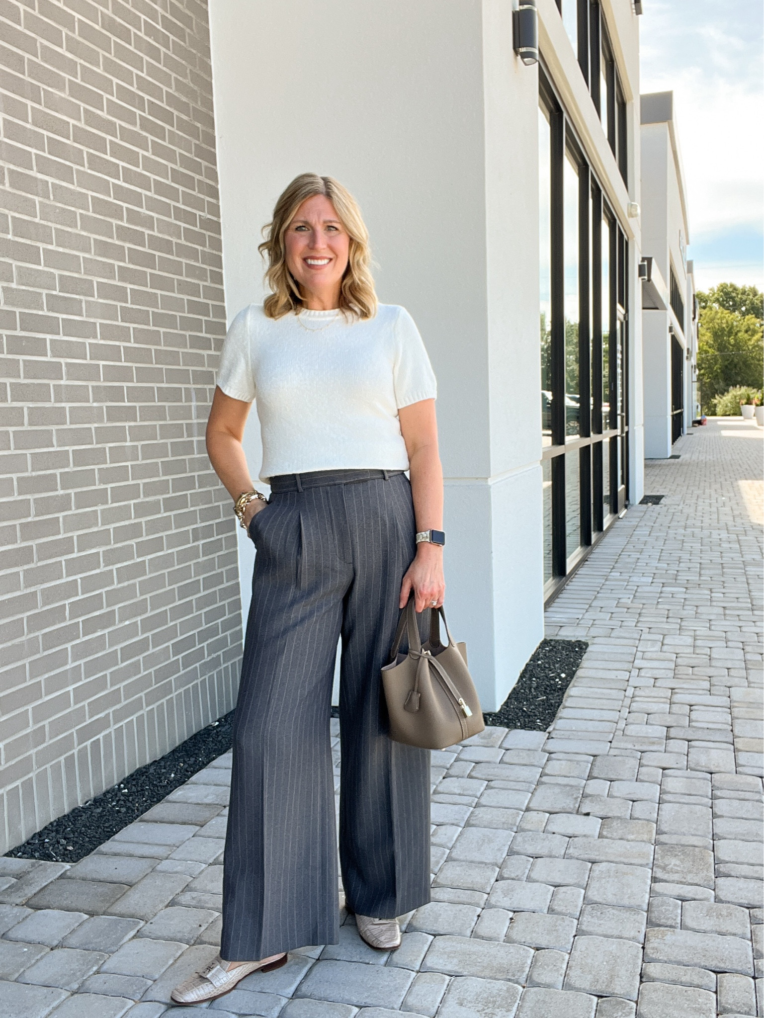 2. A&F Harper Tailored Ultra- Wide leg pant in gry pinstripe. pleated, relaxes and drapey. Runs tts.
3.  Textural crew sweater tee. 4 colors, fitted silhouette,  another closet staple for the fall. Fitted silhouette. Runs tts. 


#LTKWorkwear #LTKStyleTip #LTKFindsUnder100