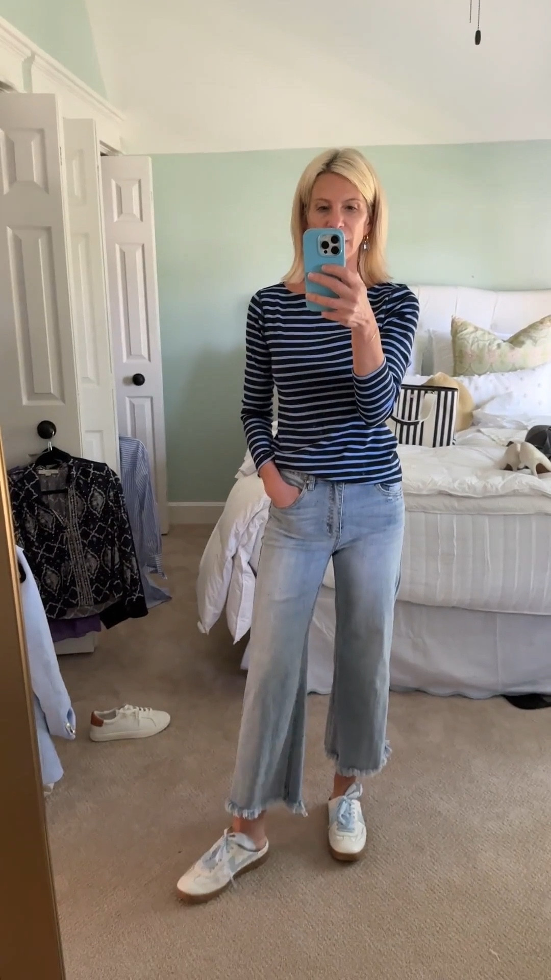 Ignore the messy room… focus on the stripes 😉 One of my favorite boat neck striped tops with cropped fray-hem jeans. Easy, casual, and still cute. #OOTD

#LTKStyleTip