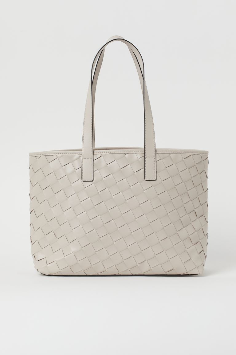Shopper in braided faux leather with two handles. Inner compartment with zipper. Taffeta lining. | H&M (US + CA)