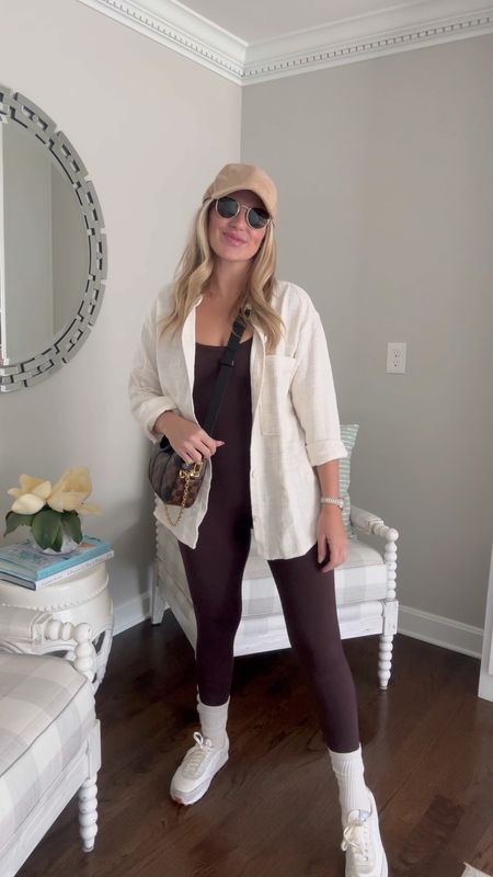 Wearing vs. styling an athletic jumpsuit! Purchased this one from Vuori to minute it launched. I love the brown color to dress down or up for fall & winter. Styled here with an oversized linen button down & casual sneakers. Elevated it with jewelry and gold accents  

#LTKSeasonal #LTKstyletip #LTKfindsunder100