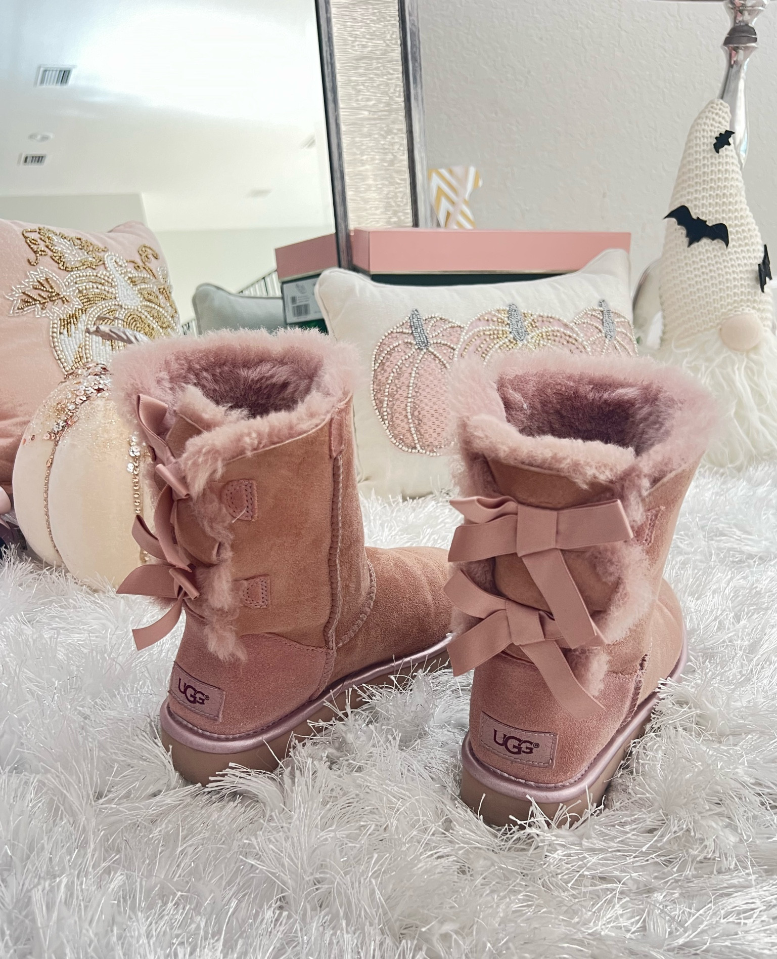 Bow Ugg Booties! My favorite for cozy Fall outfits and winter vacation. Also linked an ugg comparable from Amazon (in brown and pink). Xoxo #LTKtravel 

#LTKU #LTKSeasonal #LTKshoecrush