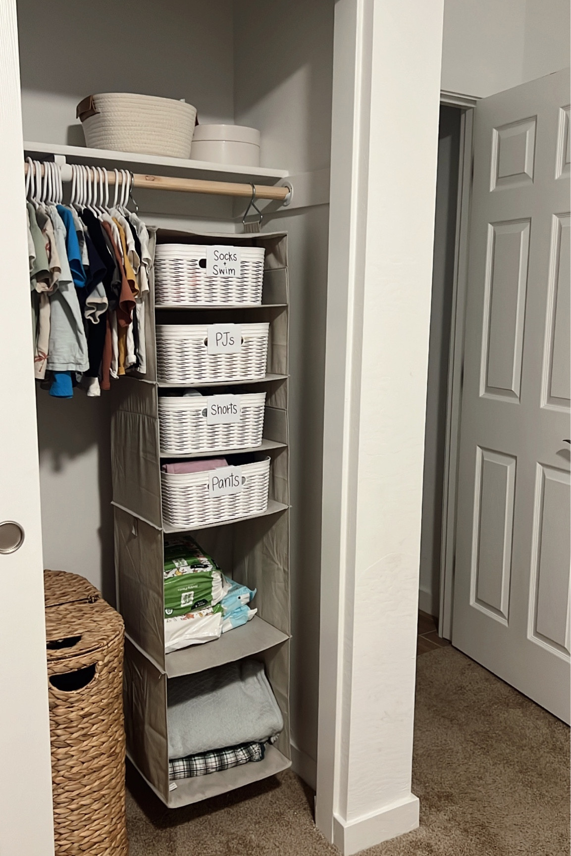 Ditched the dresser and simplified my toddlers clothing storage to create more space in his room to play and less work when putting away laundry! #toddlerbedroom #homeorganization

#LTKhome
