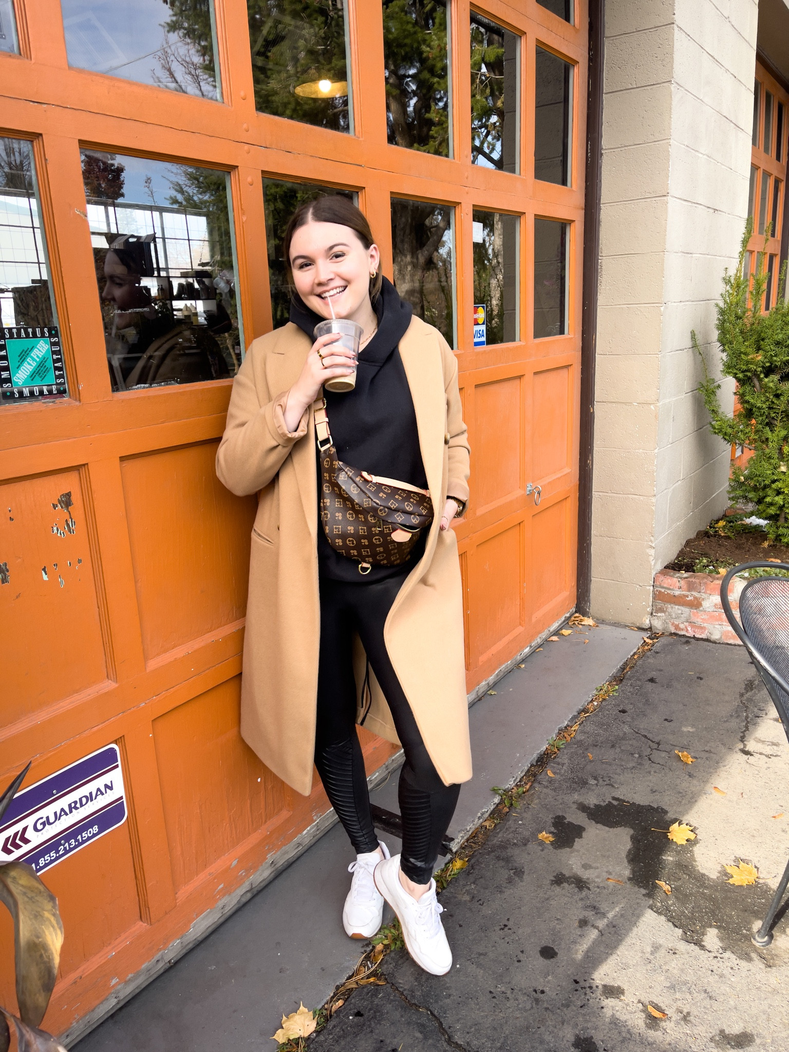 Casual cool girl fall/winter outfit idea! Featuring spanx moto leggings and the perfect camel coat 

I’m wearing a 8-10 coat, size M hoodie and leggings and size 9 sneakers 

#LTKunder100 #LTKstyletip #LTKSeasonal