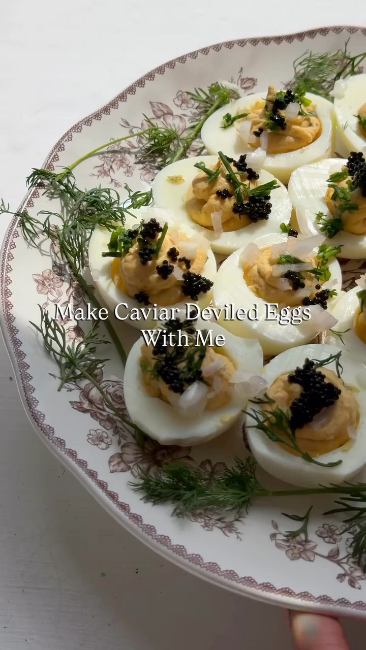 The perfect last minute Easter app that everyone will love🐰🌸🥚🩵

Caviar Deviled Eggs 

Ingredients:
8 hard boiled eggs, peeled
1/4 cup Greek yogurt
1/4 cup @hellmannsmayonnaise Lite 
1–2 tbsp Dijon mustard
1–2 tsp hot sauce (to taste)
1 small shallot, finely diced (reserve some for topping)
Fresh dill & chives, finely chopped (reserve some for topping)
Smoked paprika, Garlic powder, Onion powder, Salt, pepper.
Caviar of your choice

Instructions:
Slice the hard boiled eggs in half lengthwise. Gently remove the yolks and place them in a bowl. Arrange the whites on a serving platter.
Mash the yolks until smooth, then mix in Greek yogurt, mayonnaise, Dijon mustard, and hot sauce until creamy.
Fold in most of the diced shallot, dill, and chives (saving a little for garnish).
Season with smoked paprika, garlic powder, onion powder, salt, and pepper to taste.
Spoon or pipe the filling back into the egg whites.
Top each egg with a small spoonful of caviar. Finish with the reserved shallots, & fresh herbs.