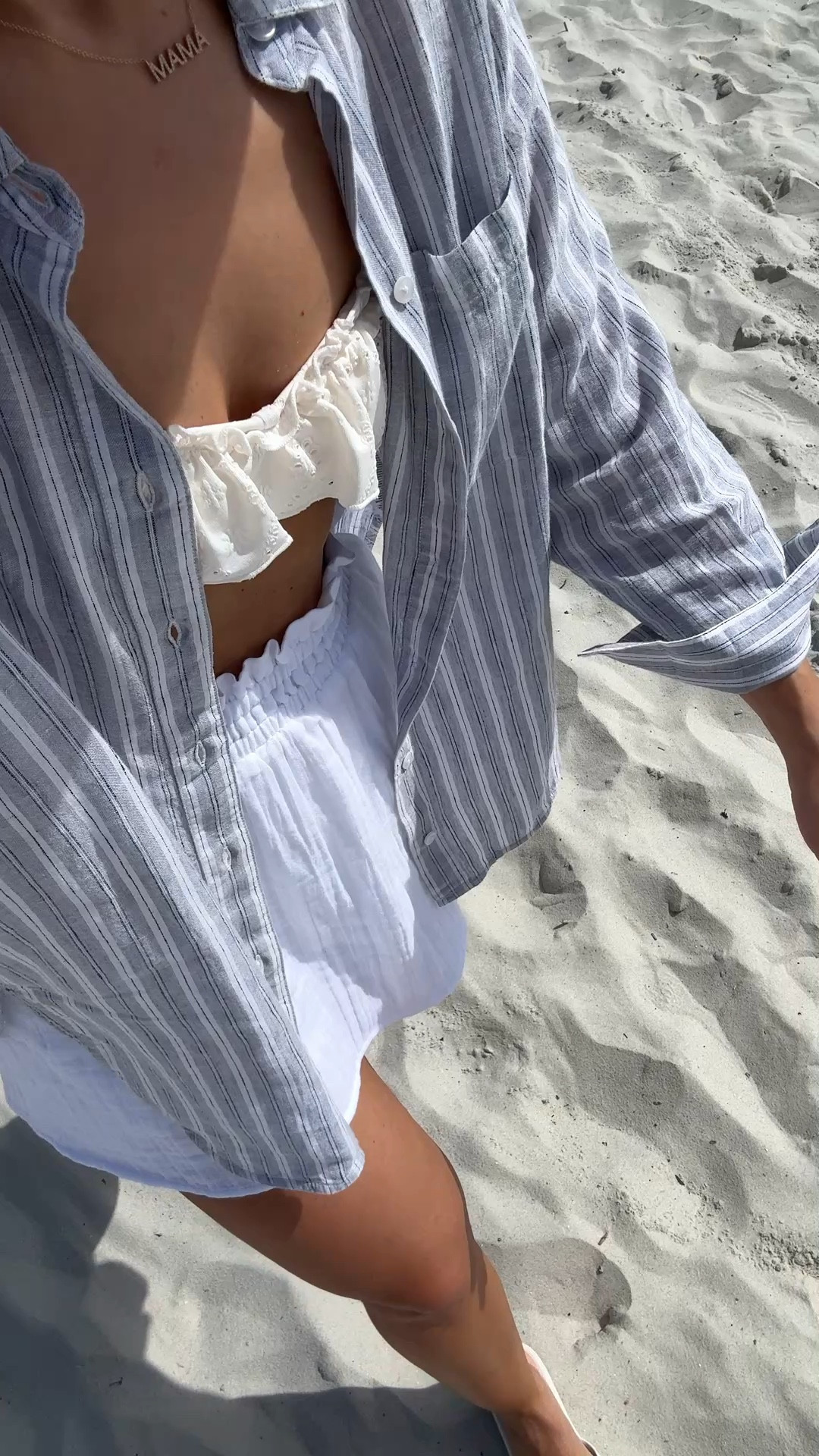  beach #ootd here! Old Navy linen blend shirt in XS petite. Old Navy beach skort in XS petite. Love this straw hat! Target mid-rise ruffled bikini in XS. Tory Burch jelly buckle slide sandals. Resort outfit. Resort wear. Vacation outfit. 

#LTKootd #LTKSwim