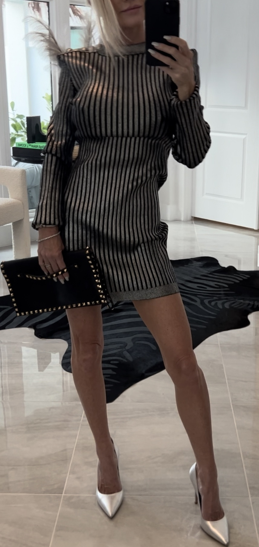 This silver iridescent Balmain dress is perfect for date night tonight!!!! 💕❤️💕

I can not  tell you how many times I have rocked this Valentino Rockstud clutch! To me it’s an edgy classic. 


#LTKstyletip #LTKover40 #LTKparties