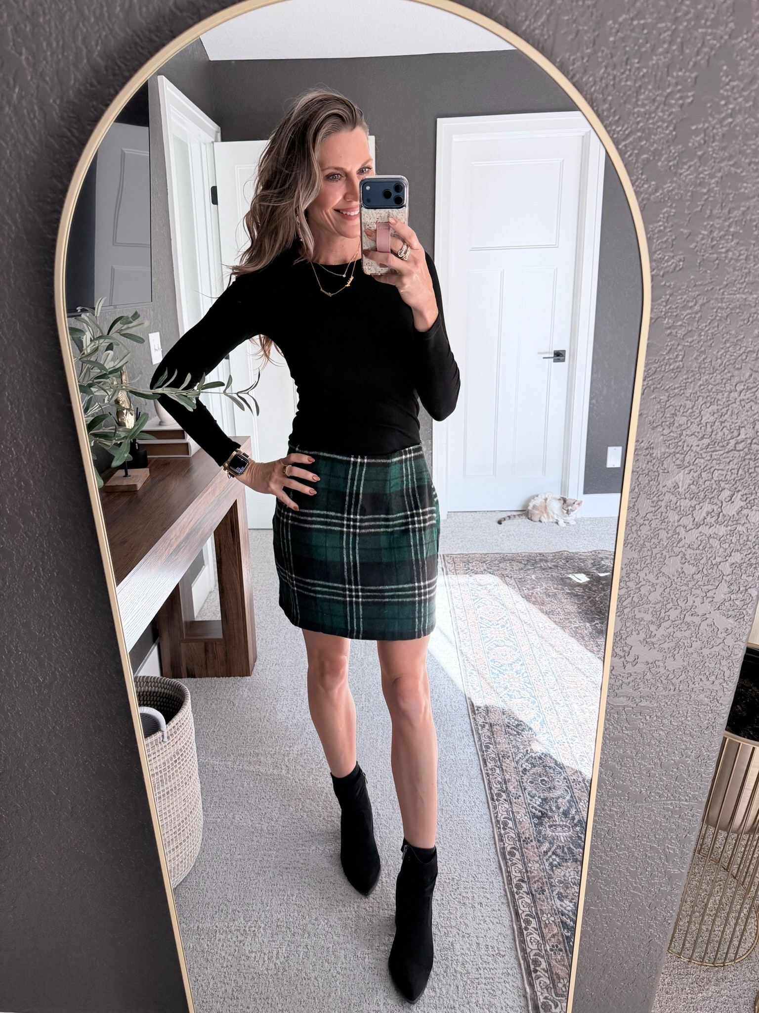 Holiday outfit inspo: a timeless plaid skirt, fitted black top, and the comfiest ankle boots. Linking all pieces for you! 🎄✨

#LTKFindsUnder50 #LTKHoliday #LTKootd