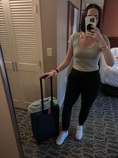 Vegas Airport Outfit - Heading to the airport in my comfy Lululemon fleece joggers, Nike sneakers, Vuori built-in bra top and Aloha Exchange crop sweatshirt. Most important thing is to be warm and comfy while traveling! 

#LTKtravel #LTKstyletip #LTKSeasonal