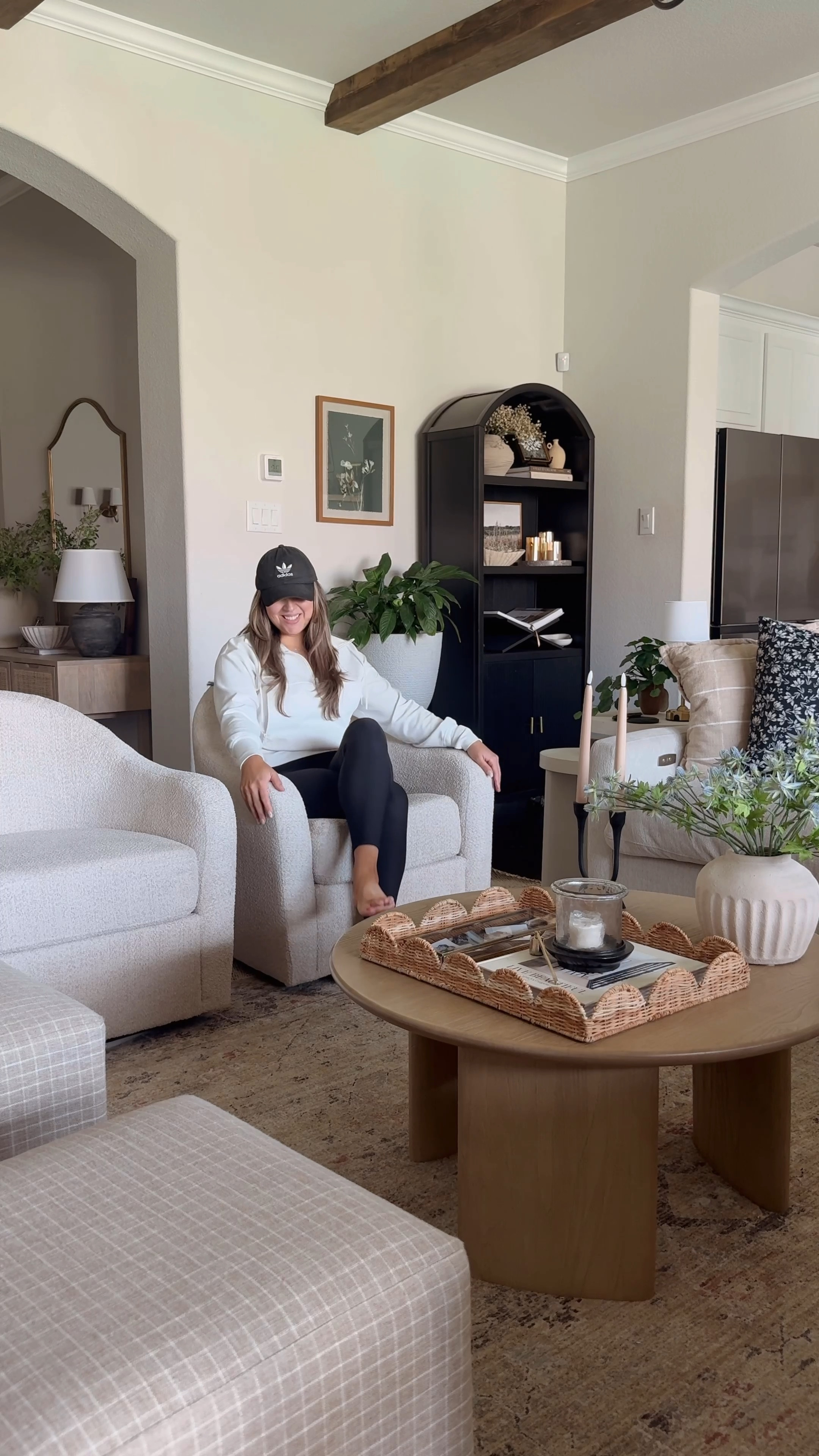 Amazon swivel chairs, living room accent chairs, wood coffee table, round coffee table, fluted bookcase, Amazon home finds, coffee table styling, boucle accent chair 

#LTKHome