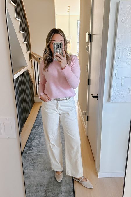 Casual spring work from home outfit. Spring cashmere crewneck sweater. White wide leg jeans. Silver belt. Slippers

#LTKstyletip #LTKworkwear #LTKSeasonal