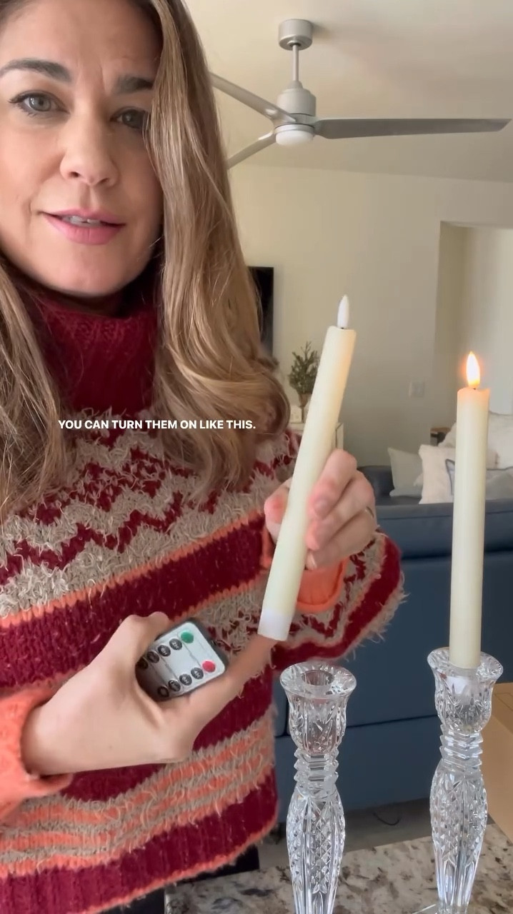 These gorgeous flameless candles are made from real wax and come with a convenient remote control. With a flickering setting that adds a warm, cozy glow, they're perfect for holidays, weddings, or adding a touch of elegance to any space. Safe, stylish, and versatile!

#LTKHoliday #LTKVideo