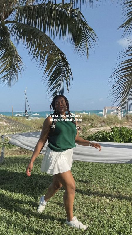 Cutest pickle ball outfit while on vacation! Wearing dark green sweater vest, white pleated tennis skirt, Reebok sneakers from DSW (linked below) 

#vacation #pickleball #workout #tennis #athleisure 

#LTKSeasonal #LTKFestival #LTKstyletip