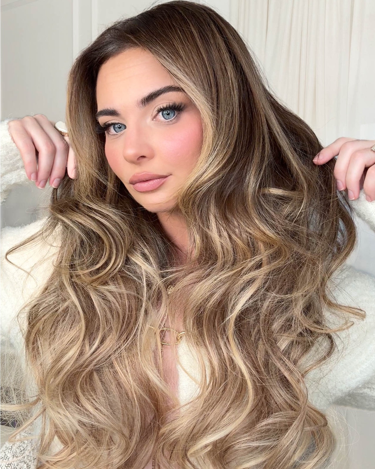 GRWM | extensions edition! This transformation is unreal! Swipe to see the before!

The @bellamihair 20” Caramel Latte Rooted Highlight clip in extensions are an absolutely perfect match - and I LOVE the dimension, volume, and length these add to my hair! 

We created a voluminous holiday look using the #bellami 1.5” curler and alternated the direction of the curls to create a full, bouncy style. 

shop this look here on my @shop.ltk page (🔗 in bio) 

Hair and makeup by my love @jackiemargotbeauty 🫶🏻
.
.
.
#ad #bellami #bellamihair #bellamipartner #bellamiclipins #clipinhairextensions #hairextensions 
