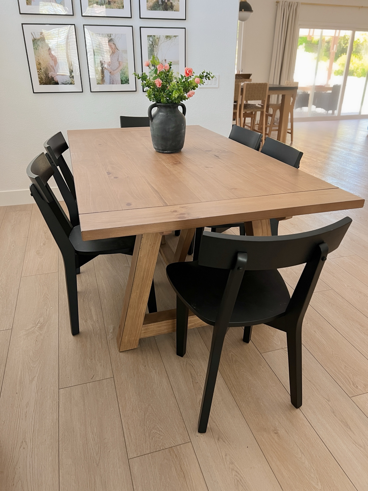Gorgeous dining table with optional extension. Black dining chairs ❤️

#LTKParties #LTKFamily #LTKHome