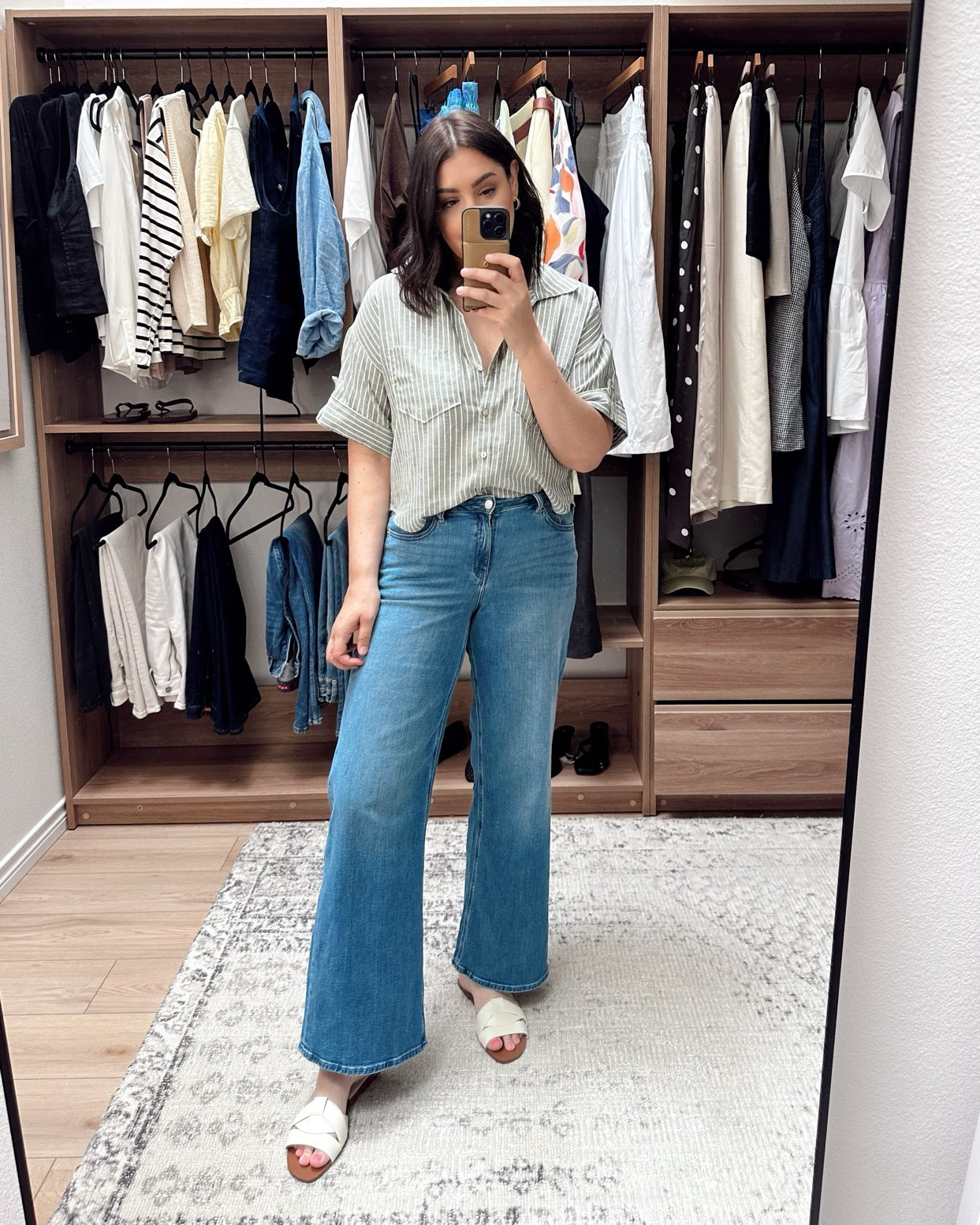 I love this shape of top from Zara. This one fit true to size for me, I’m in the large and it’s not an oversized fit or cut. It’s a more grey color than shown here. It’s lightweight and endlessly versatile with shorts and skirts this summer One of my favorite buys. 

I'm in the 30 of the jeans. 

 