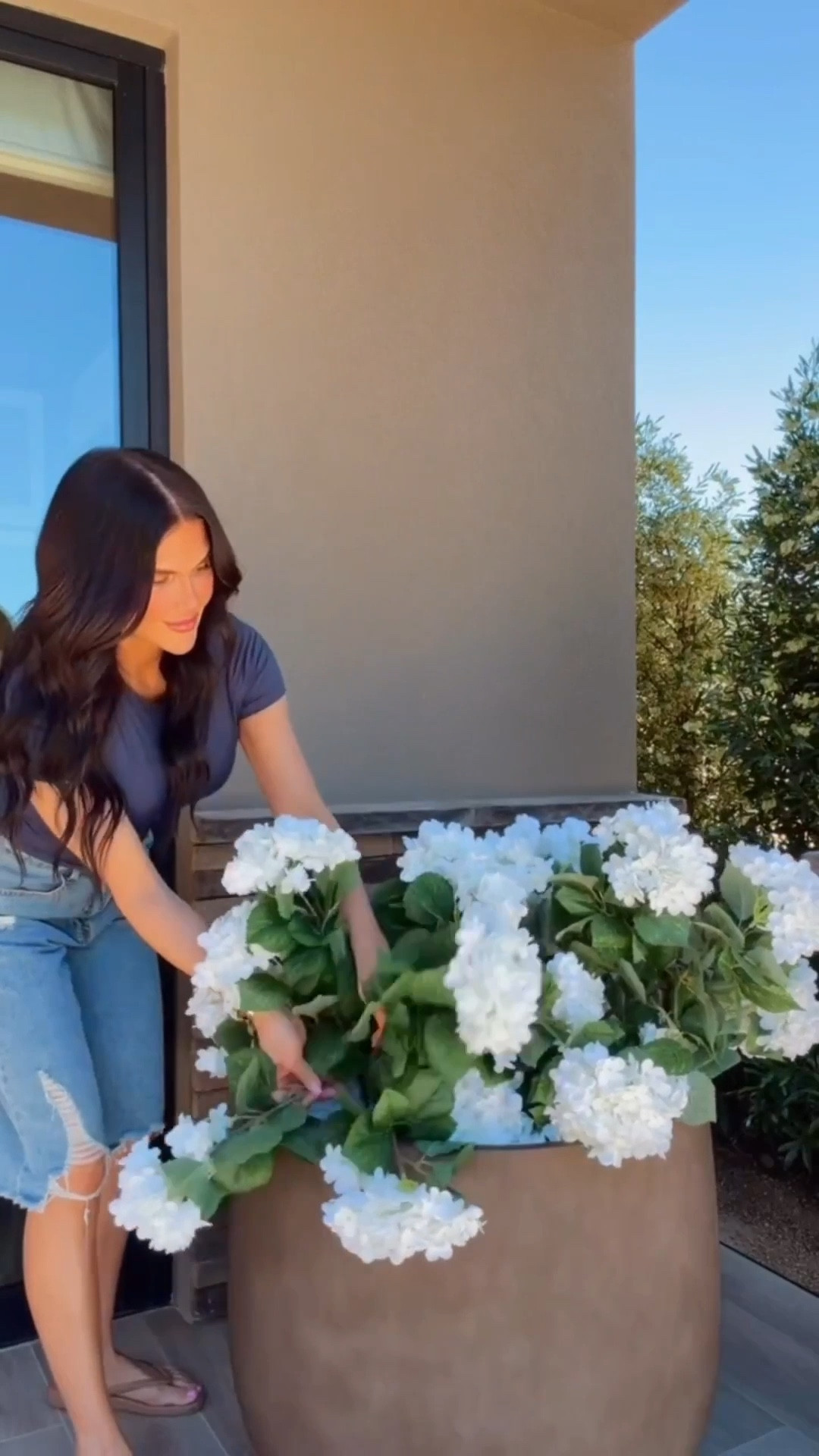 Went a little bigger with the porch this spring 🌸 These full hydrangea trees make such a statement and are UV-resistant so they stay looking beautiful outdoors.

spring porch decor
outdoor hydrangea trees
UV resistant faux flowers
large porch planters
outdoor entryway styling


#LTKHome #LTKdayinmylife #LTKvlog