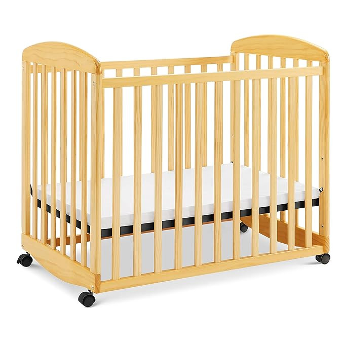 Davinci Alpha Mini Rocking Crib in Natural, Removable Wheels, Greenguard Gold Certified | Amazon (US)