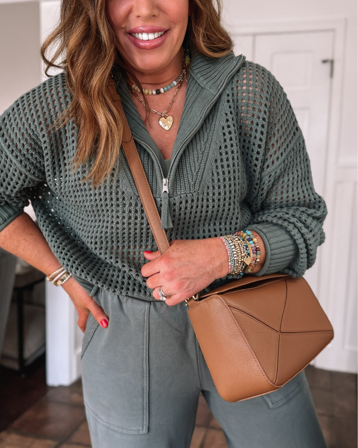 One of my best sellers is 50% off right now/$32.47 ‼️ @Aerie crochet quarter zip sweater. These green vacay joggers are also 30% off/$38.46

I'm wearing a medium in the half zip

#LTKSaleAlert