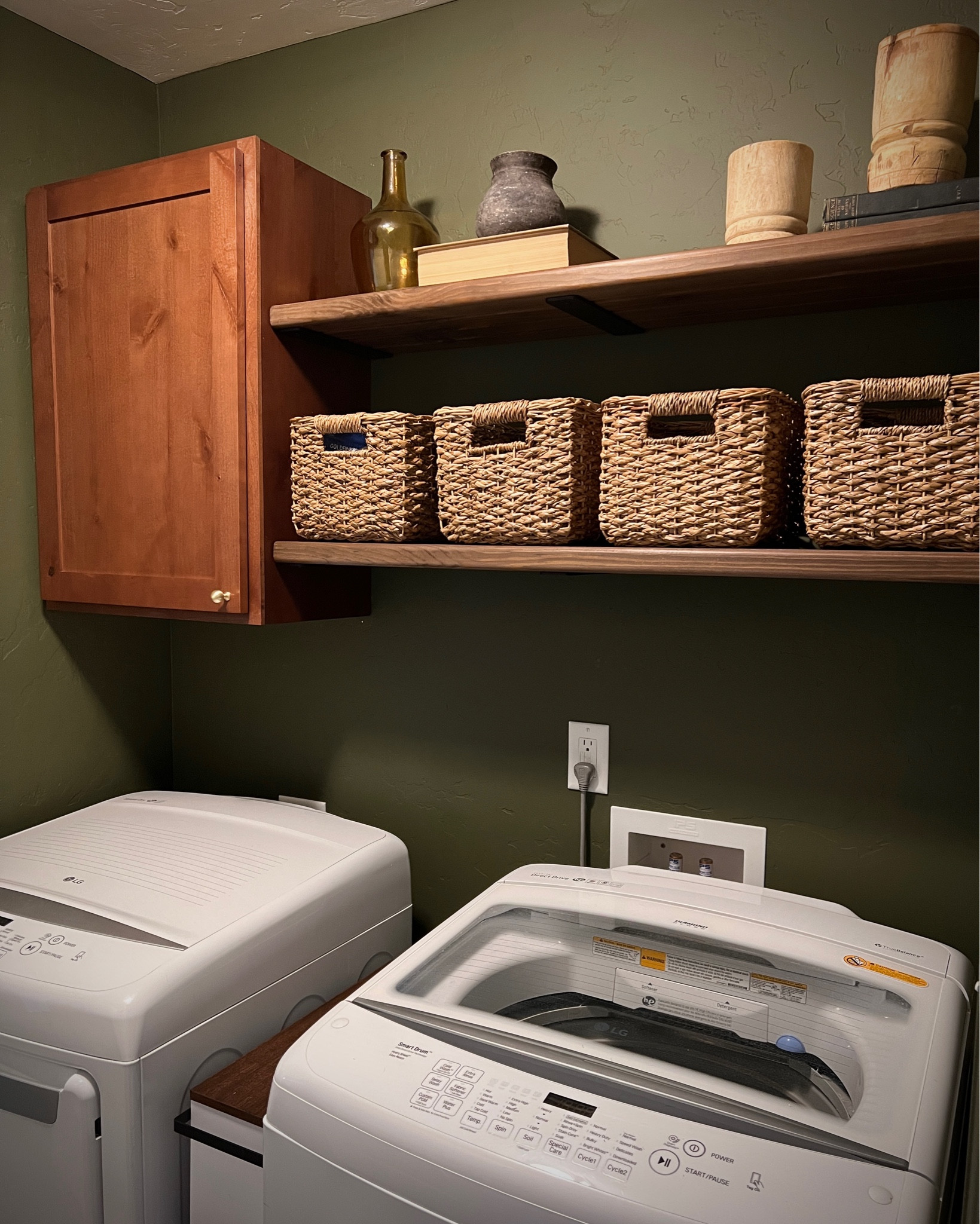 Laundry Room Update - Part 2

We repurposed the cabinet we removed from the kitchen when we installed open shelving… so the cabinet was free 🙌🏻

Found these hidden shelf brackets and used bull nose stair treads (2x12x4) for each shelf. Sanded and stained them with @varathane dark walnut and polyurethane finish.

I am so happy with how this project turned out!

diy laundry room update upgrade makeover remodel renovation project dark green paint home decor ideas inspo

#LTKHome