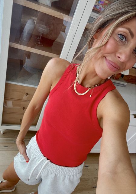 Sized up in the red tank and small shorts! Anthropologie cabinet  



#LTKStyleTip #LTKFindsUnder100 #LTKHome