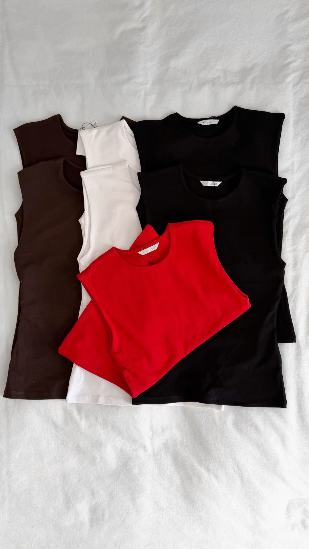 Zara sleeveless structured tank in white, black, brown, red - $20 summer basic, works with everything, layers into fall. The wardrobe hack: when you love a piece and wear it hard, buy multiples before it’s discontinued. Tank is Zara, not on LTK but easy to find on their site - everything I’ve styled it with across the summer is linked! @Zara @jcrew @Quince

#LTKootd #LTKgrwm #LTKOver40