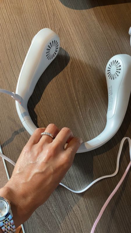Portable Neck fan. These helped make the heat in Italy more bearable for my girls. My husband wished he had one too. USB charging. They look like headphones. Adjustable fan levels. Air comes from all around. 
Travel essential. 
Amazon find. 
Travel items  

#LTKunder50 #LTKtravel #LTKeurope