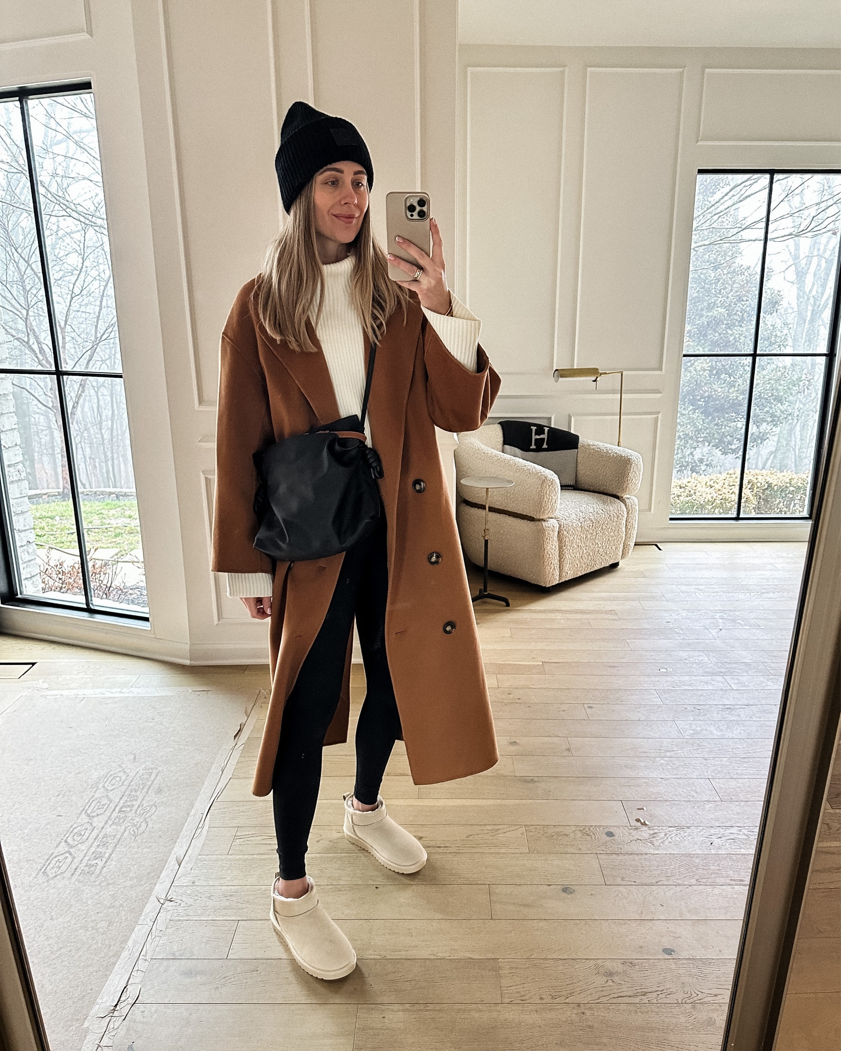 Fashion Jackson wearing camel coat, white sweater, black leggings, ugg mini boots (shoes), black beanie, winter outfit, Loewe handbag #winteroutfit #dailylook #fashionjackson #amazonfashion

#LTKunder100 #LTKshoecrush #LTKstyletip
