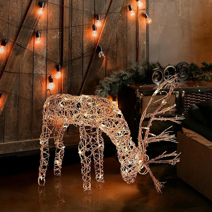 Alpine Corporation 24"H Outdoor Rattan Grazing Reindeer Lawn Decoration with White Lights | Amazon (US)