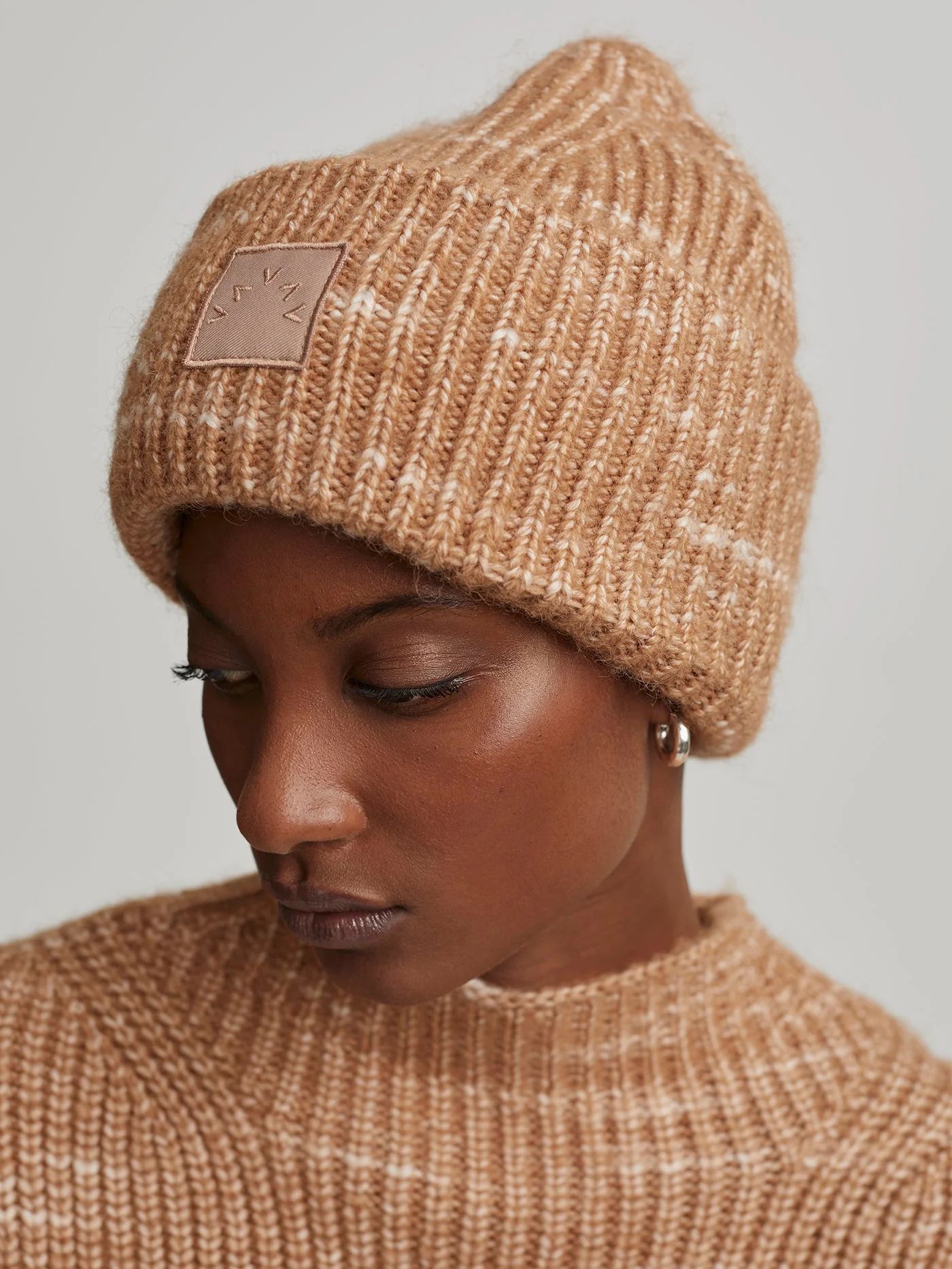 Dale Beanie9 ReviewsA classic, ribbed beanie knitted in soft and cosy flecked yarn.$60.00Color: G... | Varley USA
