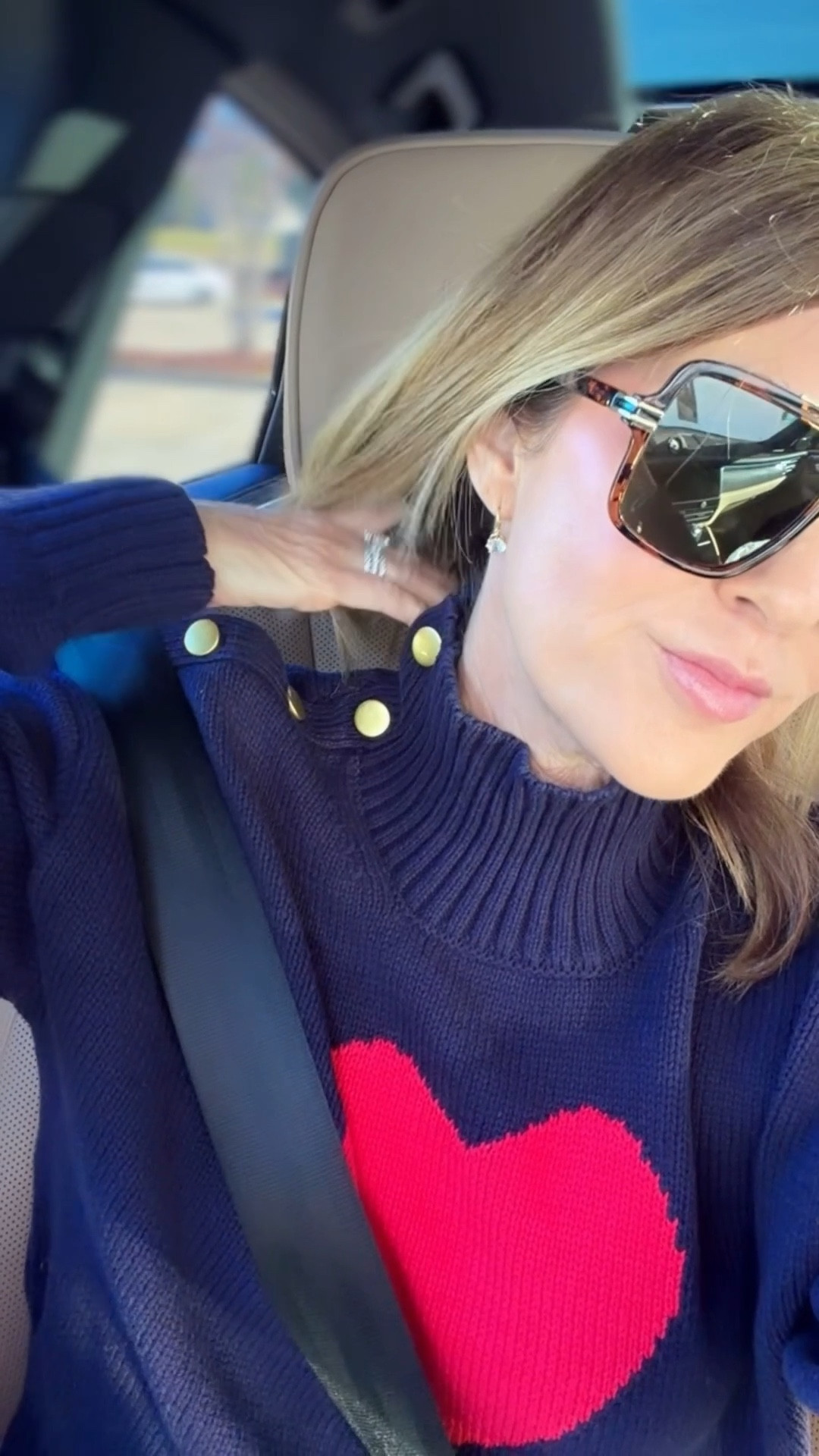 I’m wearing a medium in this oh so cute heart sweater 