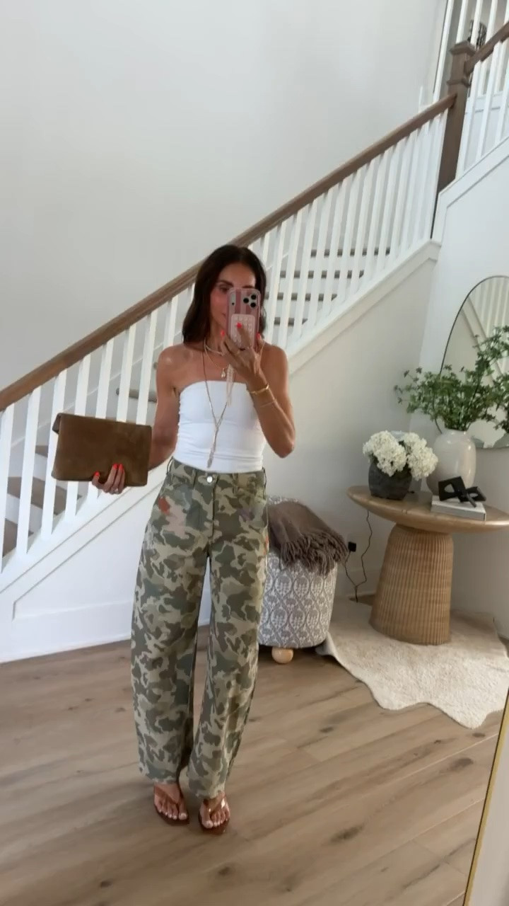 This camo and white combo is such a good way to wear fall color while it’s still warm out. The relaxed pants add the statement, while the simple strapless top and layered jewelry keep everything balanced.

camo pants, camouflage pants, early fall outfit, transitional style, white tube top, casual fall outfit, printed pants, fall color palette, everyday style, relaxed pants, annabrstyle

#LTKootd #LTKSeasonal #LTKOver40