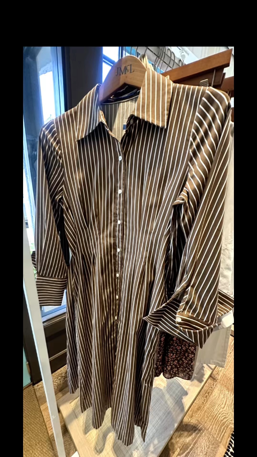 Classy brown pinstripe dress, with a pleated waist. 

#LTKWorkwear #LTKSeasonal #LTKParties