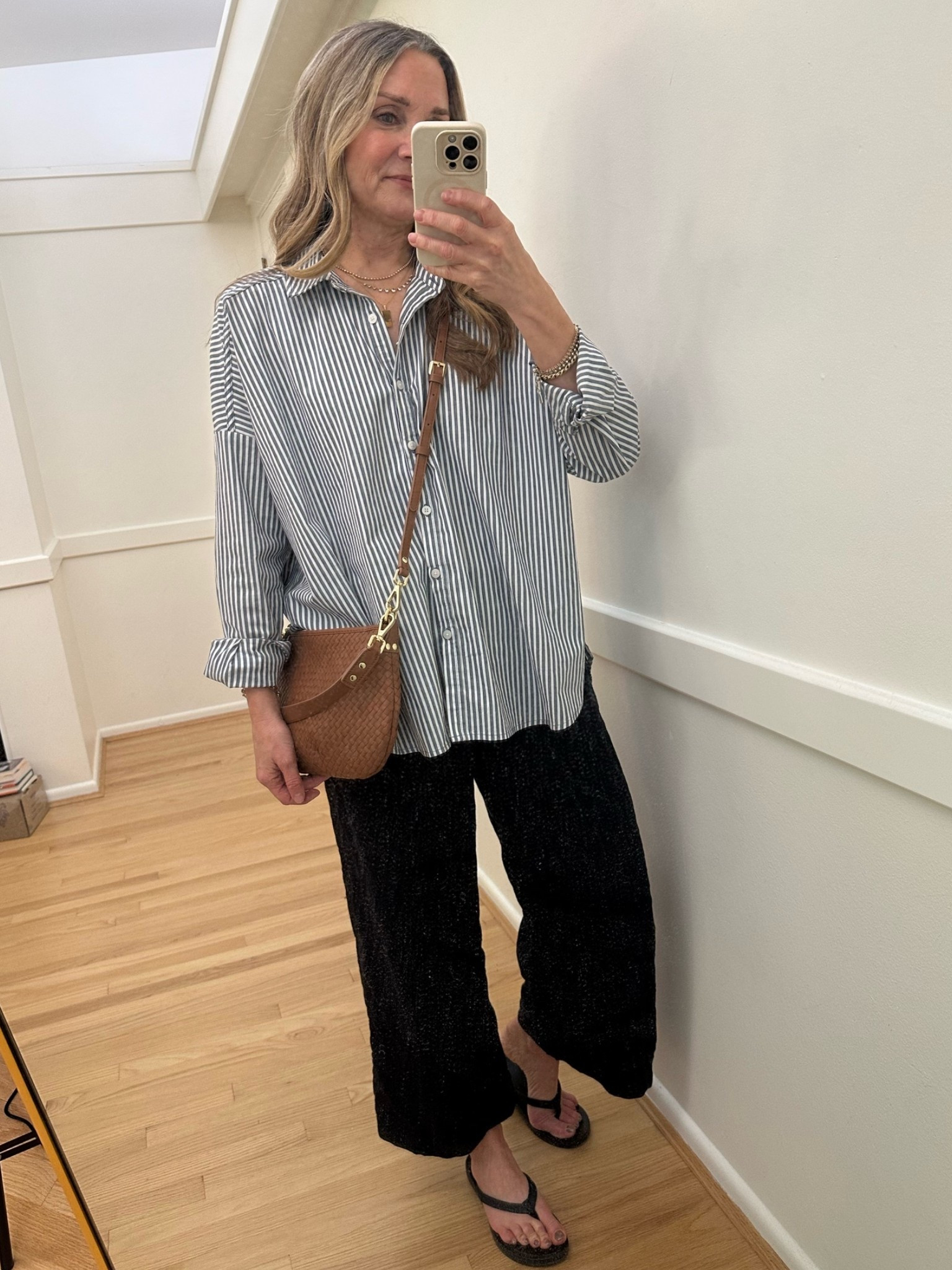 Summer outfit of the day:

@Splendid striped button up with navy wide leg crop pants. @Quince crossbody bag and black flip flops.

#LTKootd #LTKTravel #LTKOver40